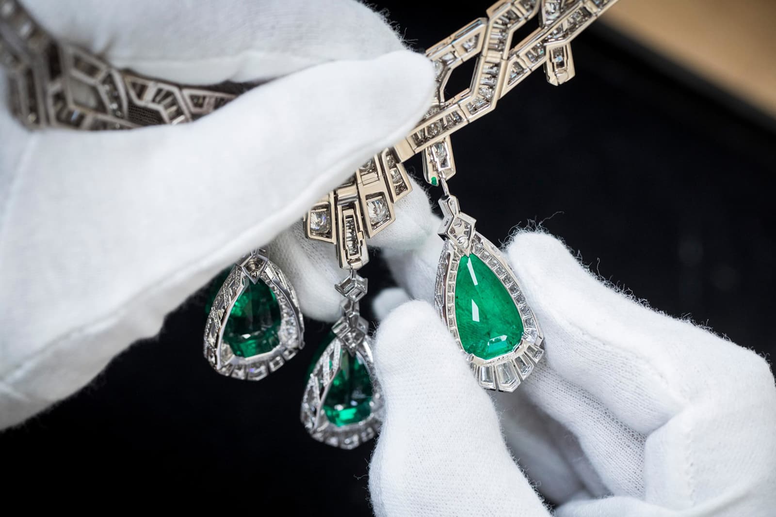 Each of the five magnificent pear shape Colombian emerald drops can be removed and attached to a pair of earrings from the same suite