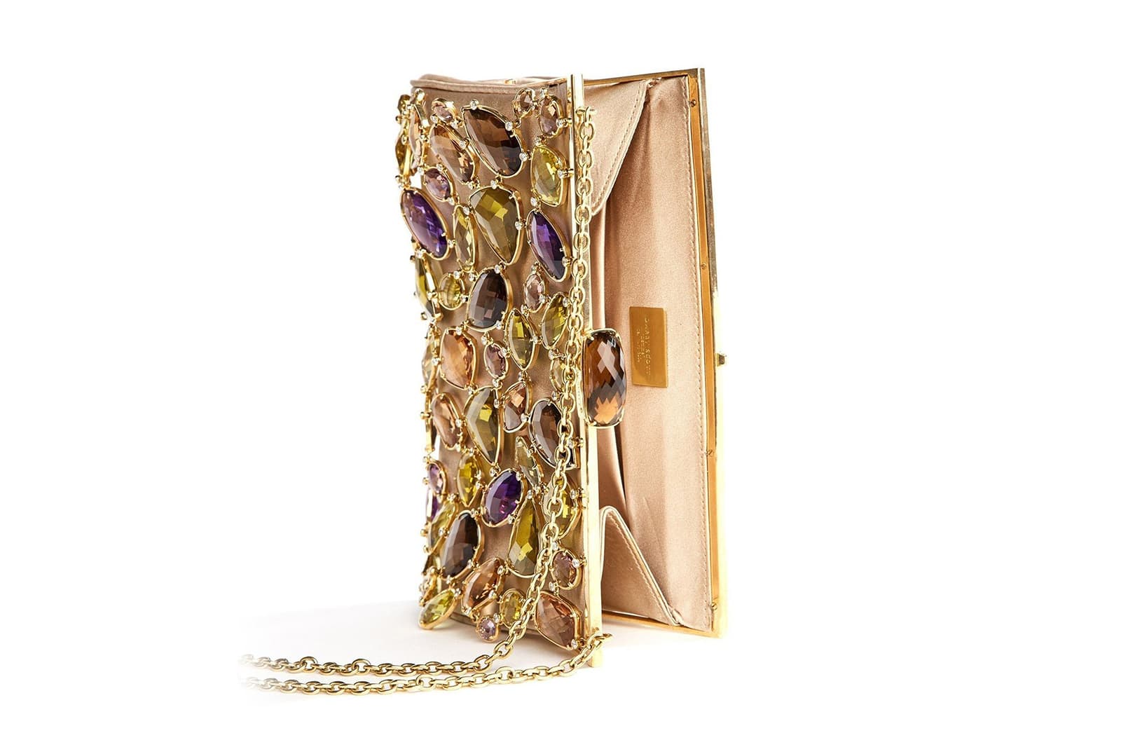  The evening bag is set with 130 coloured stones, including ametrine, amethyst, lime citrine, champagne topaz and smokey topaz, and diamonds over champagne silk