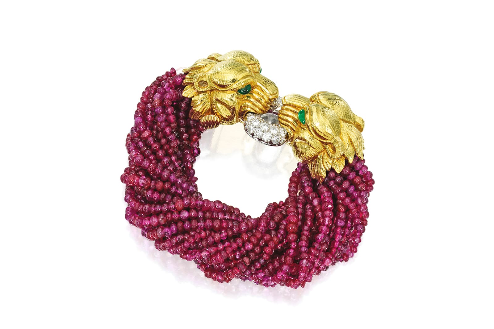 The David Webb Elizabeth Taylor Lion bracelet in yellow gold with ruby beads, diamonds and emeralds