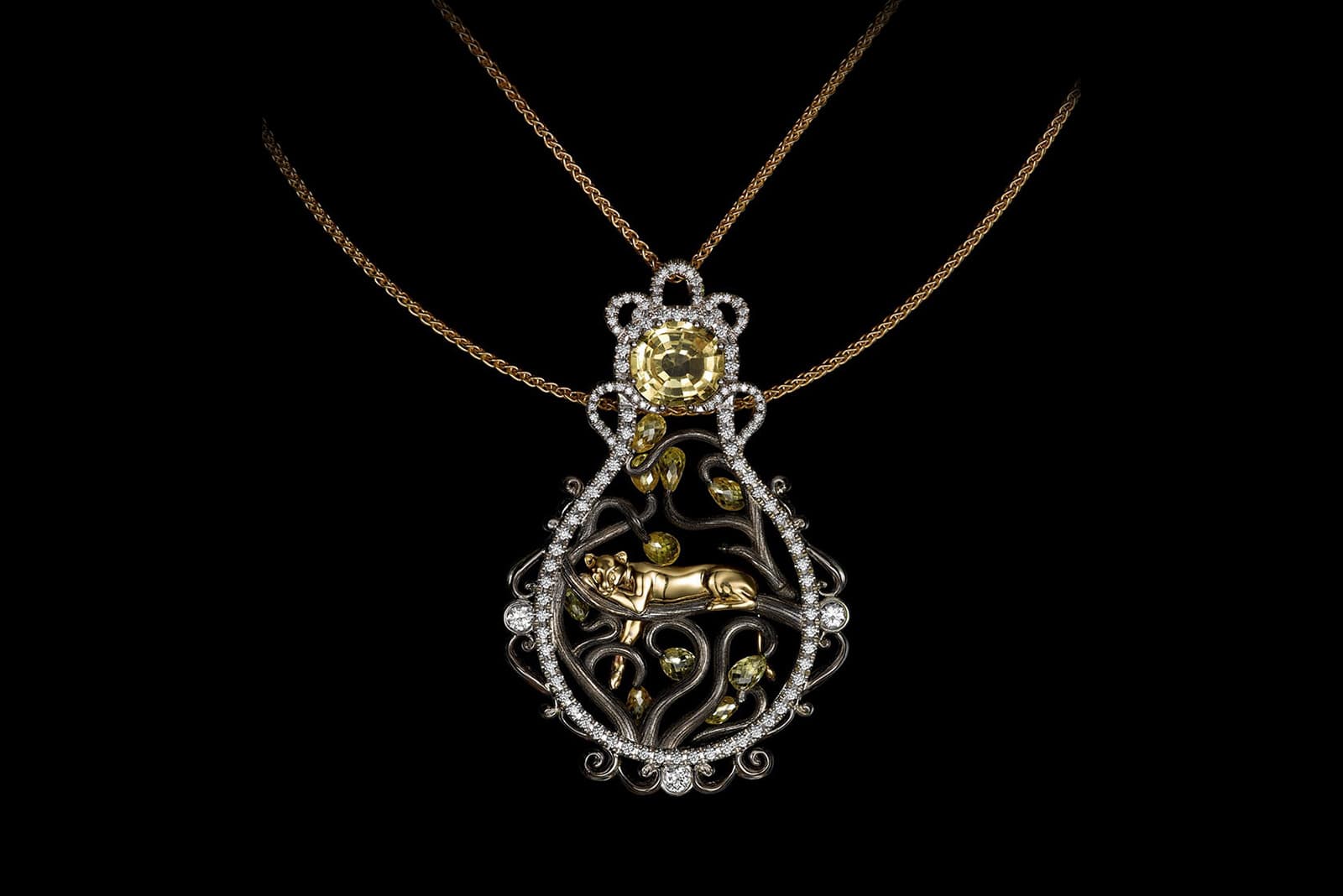 Volund Lioness diamond and sapphire pendant in 18 carat white and yellow gold