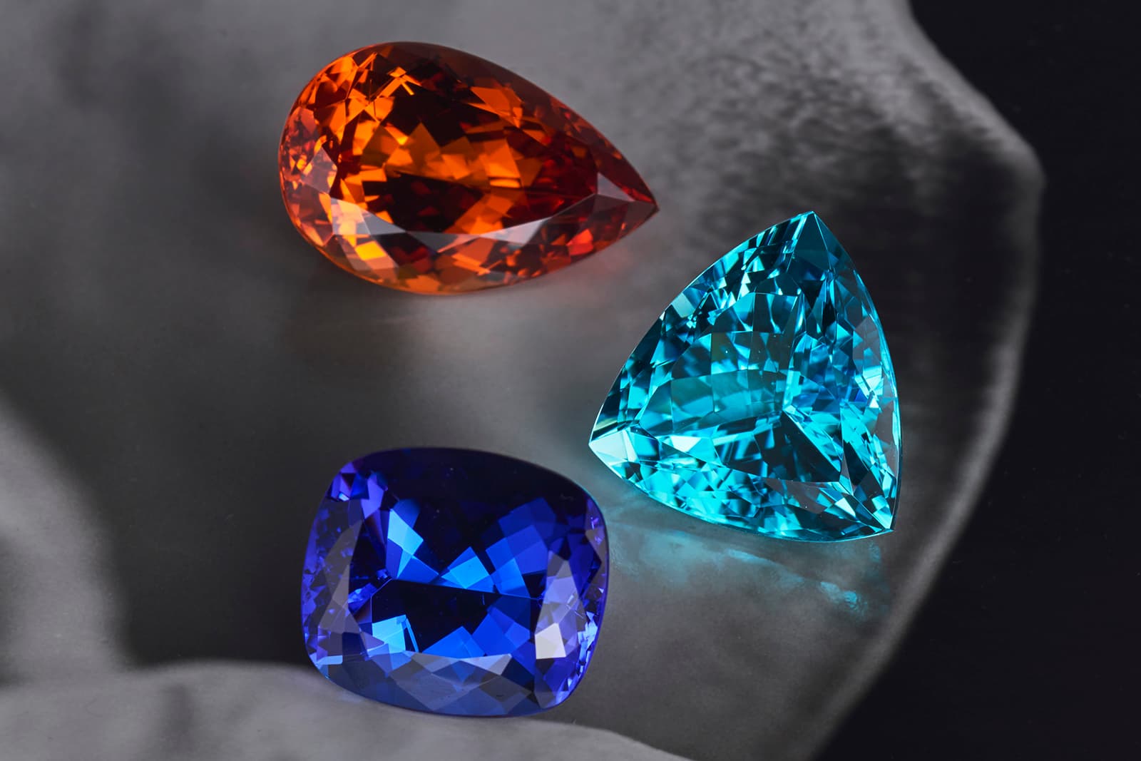 At Leyser, each exquisite gemstone, like this very fine Paraiba tourmaline, mandarin garnet and tanzanite, has a story to tell