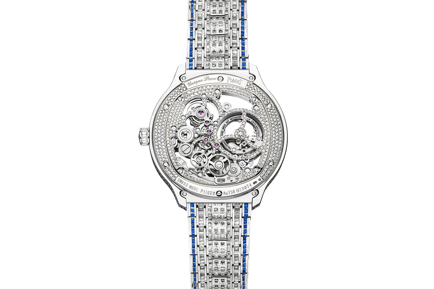  The reverse of this numbered edition timepiece reveals the beautifully bejewelled, skeletonised movement