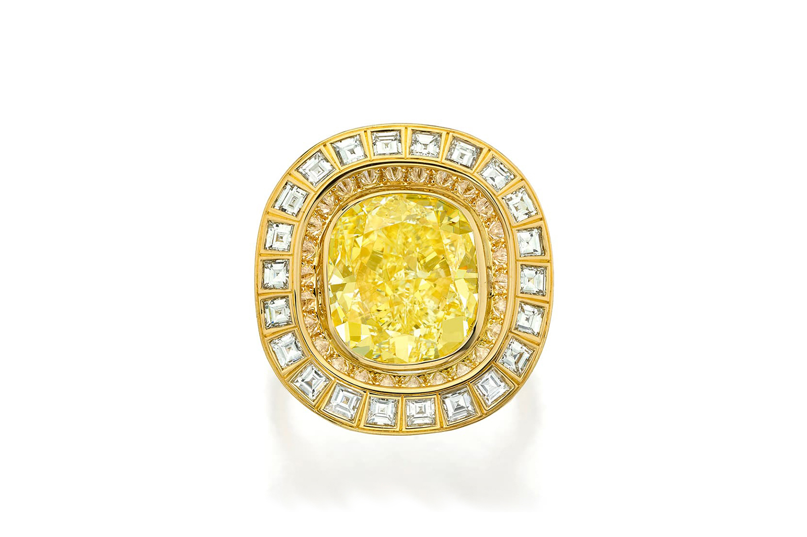  The rings features a 7.68 carat Fancy Yellow, Internally Flawless cushion-cut diamond encircled by a halo of calibrated hexagonal diamonds in platinum and 18 carat yellow gold