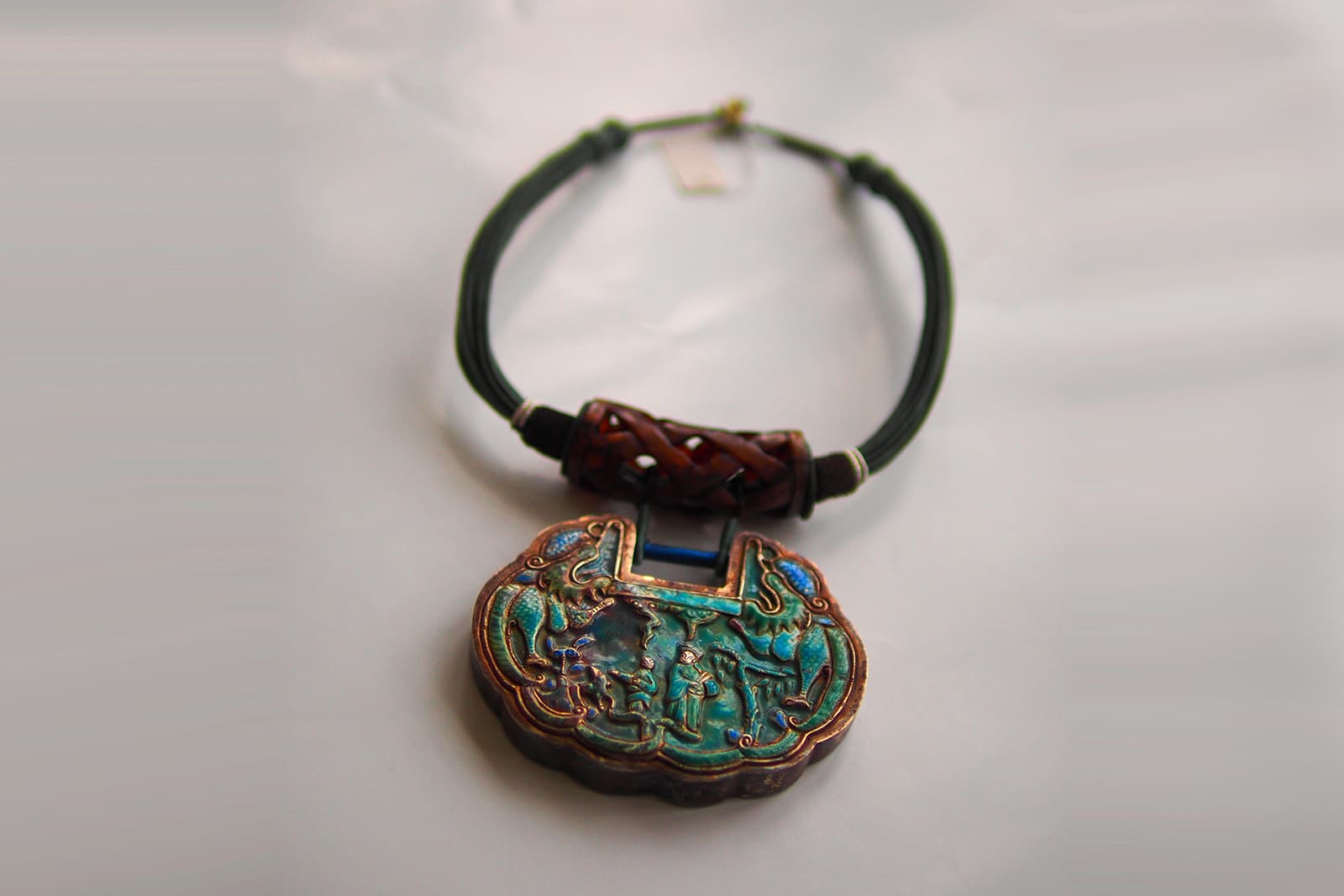Beijing enamel is a particular cloisonné technique used in Chinese jewellery making