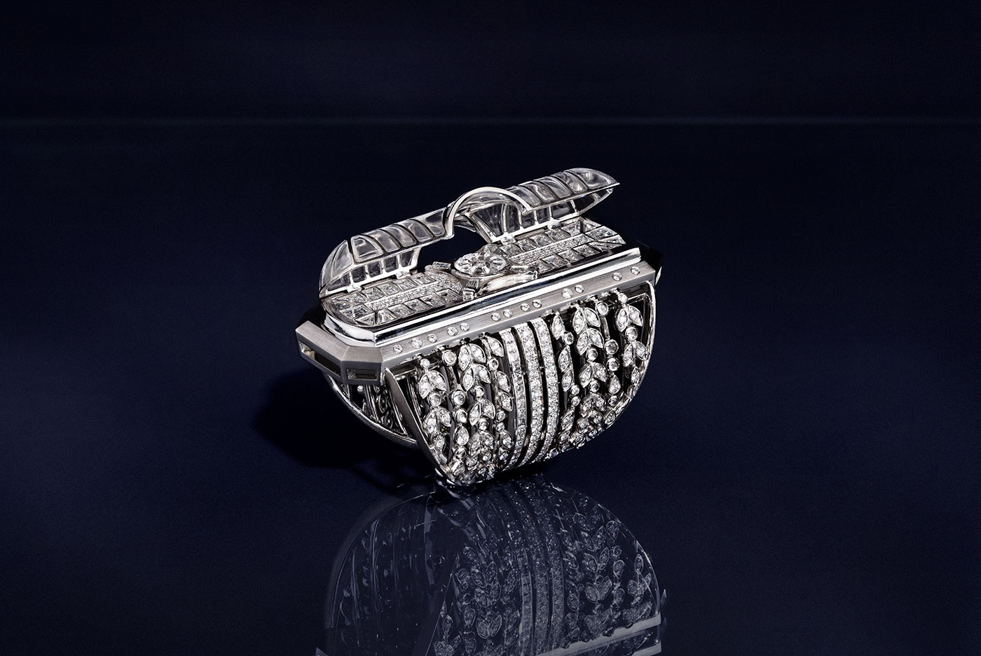 Irène Studio the Glass Roof opening ring from the Scenography collection made in gold with diamonds, white sapphires and rock crystal