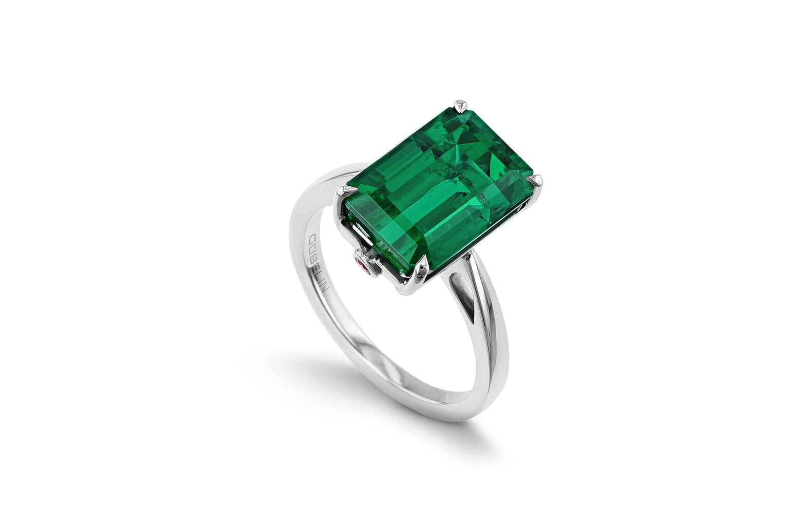  Gübelin Jewellery Ancient Path ring in platinum set with a Brazilian emerald cut emerald