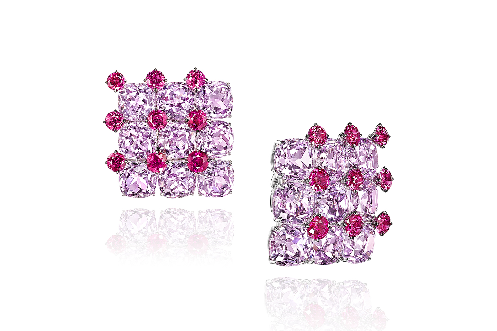  Another pair of earrings feature kunzites complemented by ruby accents