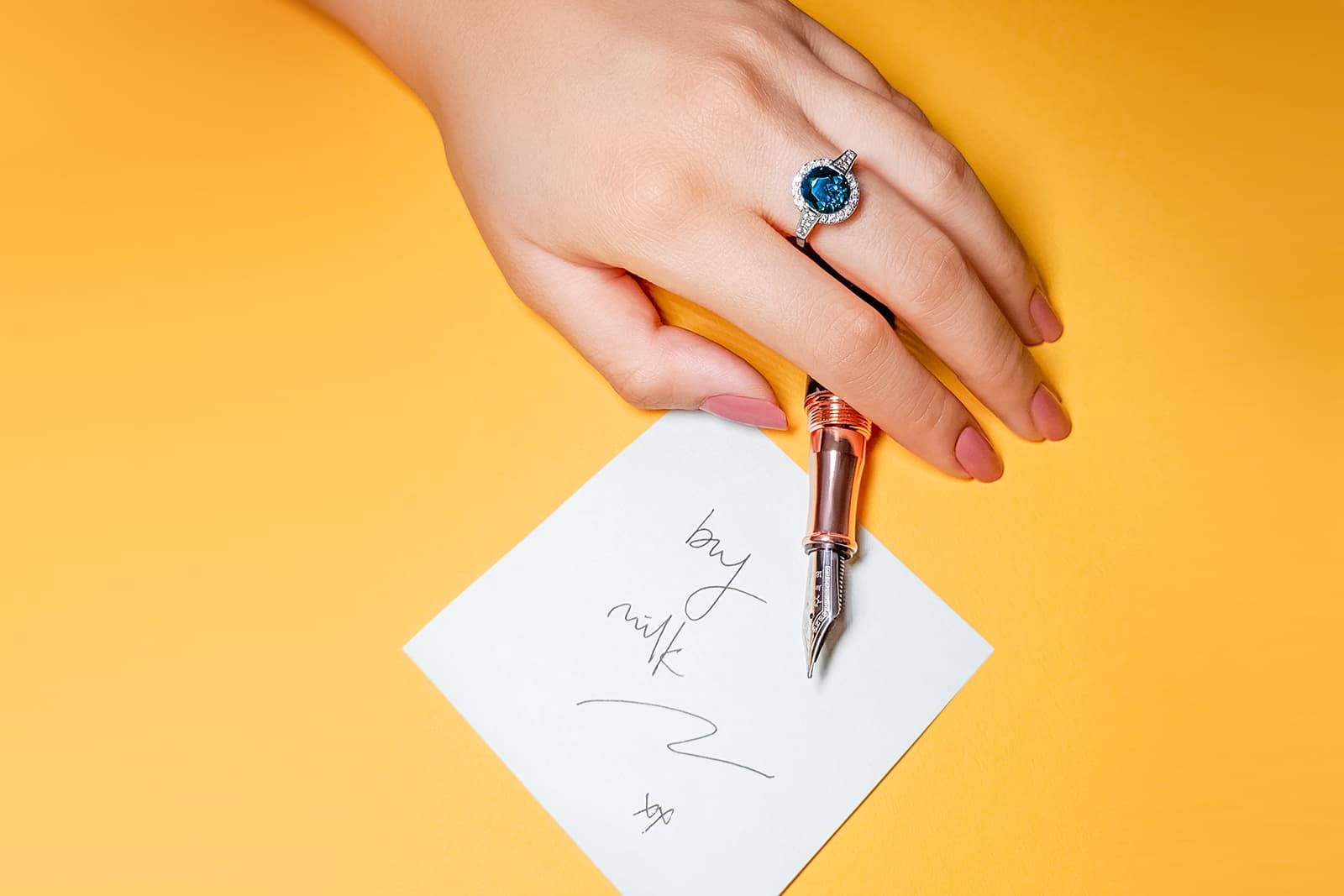  A classic Madly design showcasing a magical and mysterious teal-blue sapphire weighing over 2 carats