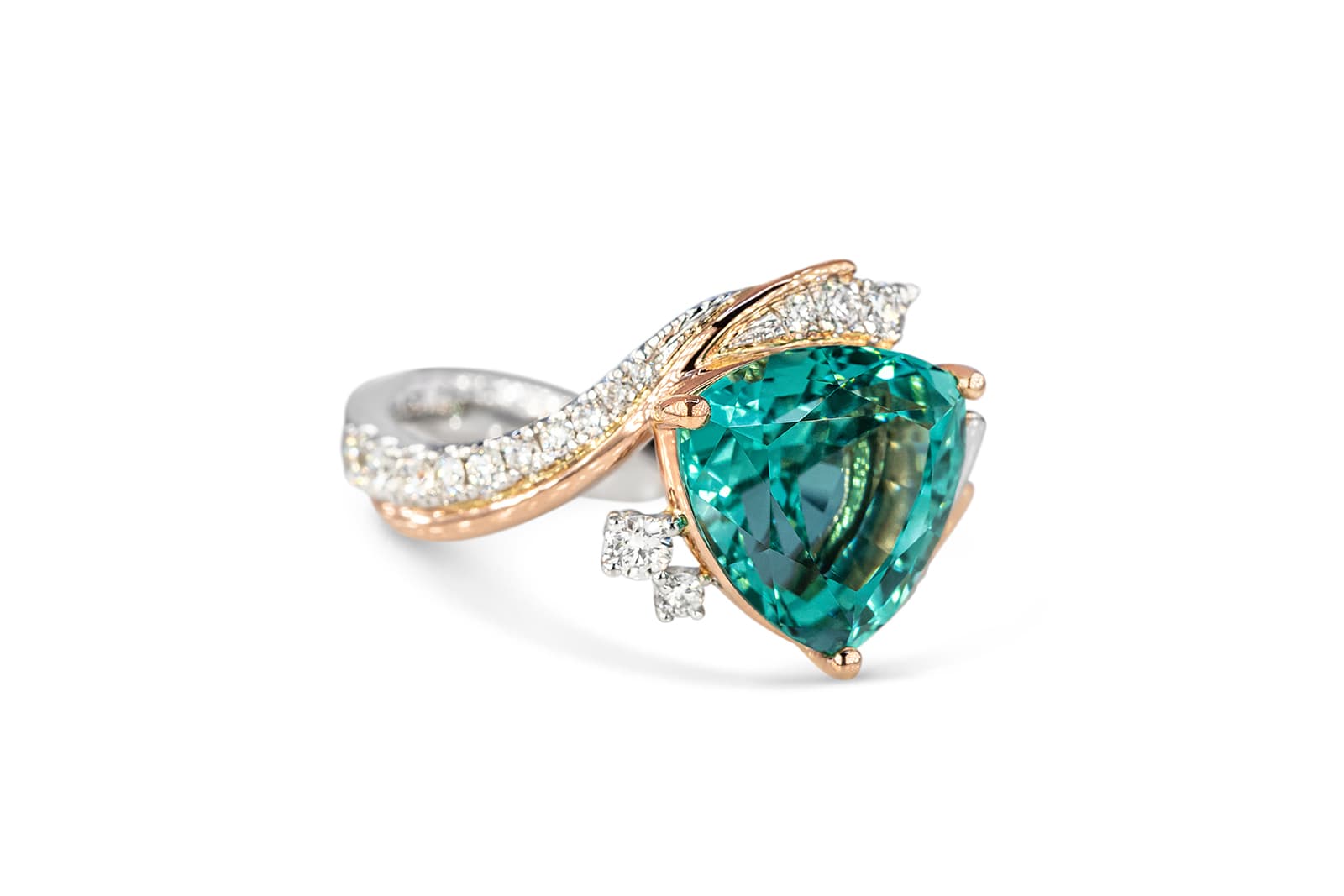  Swooping layers of rose and white gold adorn this lagoon tourmaline ring by Madly 
