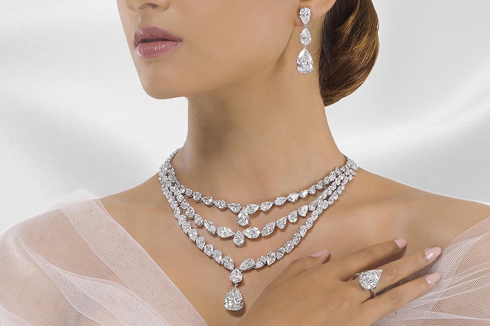One-of-a-kind necklace by Jahan featuring three magnificent tiers of classic pear shape and marquise cut diamonds