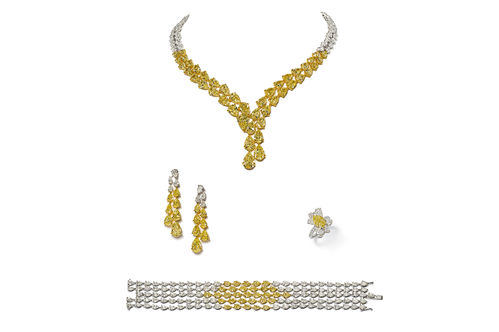  This mesmerising set of Fancy yellow and white diamond jewels celebrates the timeless elegance of pear shape diamonds