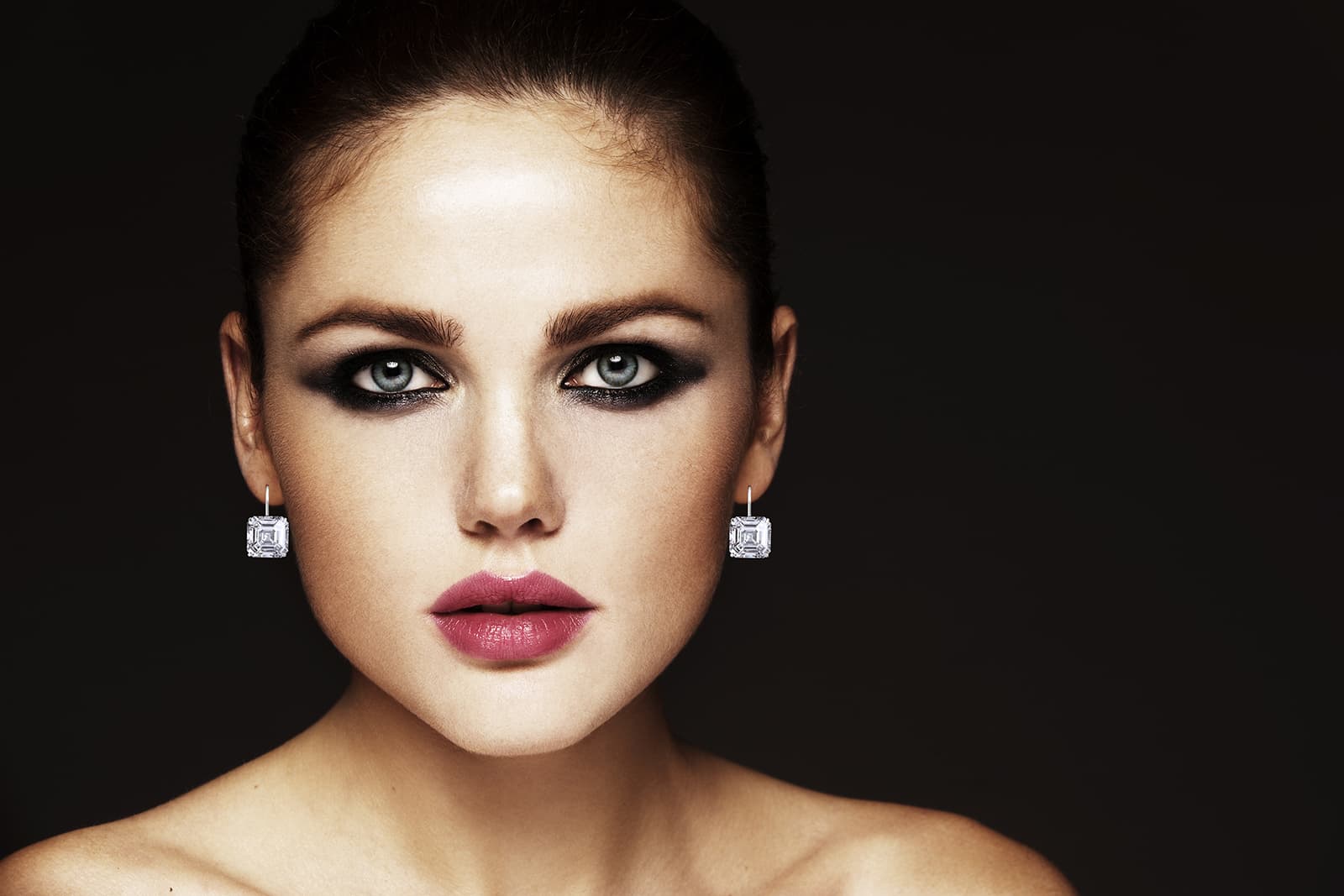  Bespoke LEVUMA earrings set with a perfectly matched pair of Asscher cut diamonds weighing 10 carats each