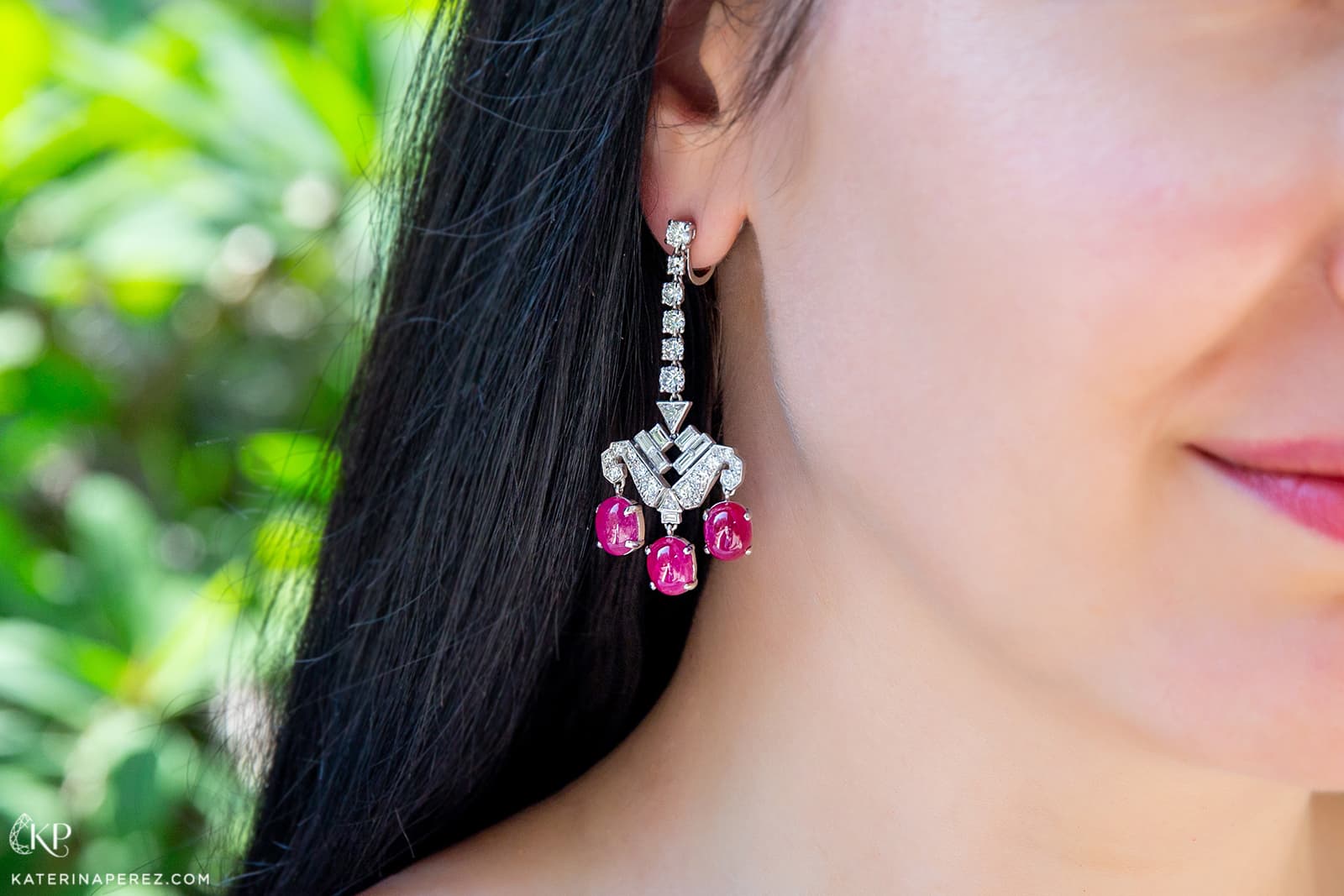  Cartier Art Deco chandelier earrings in platinum set with cabochon cut rubies and diamonds, circa 1930