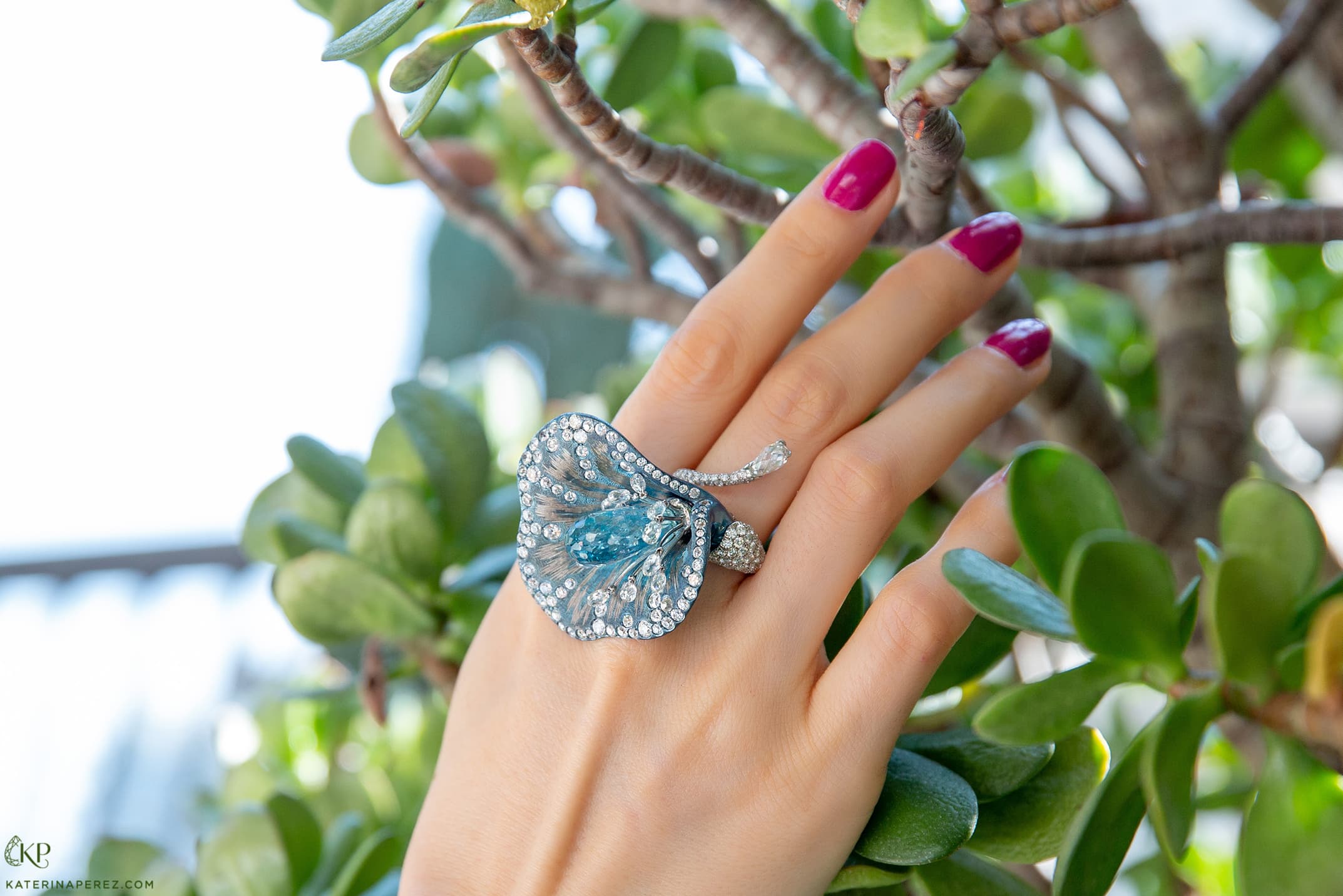Contemporary Italian titanium flower ring set with a 16 carat aquamarine and 7 carats of diamonds, available at Galerie Montaigne