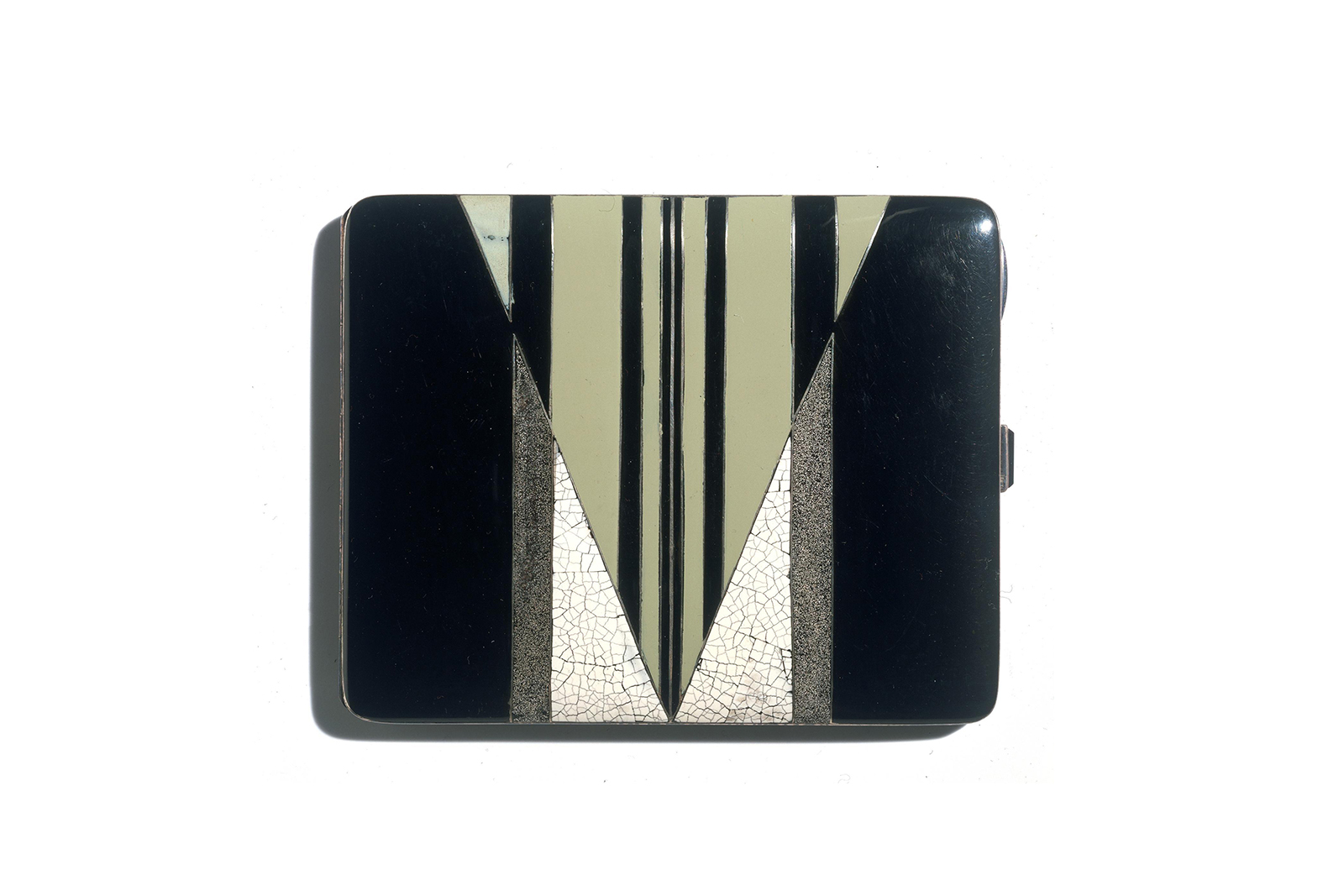  Gérard Sandoz enamelled silver, lacquer and eggshell cigarette case, circa 1929. Courtesy of the V&A Museum, London