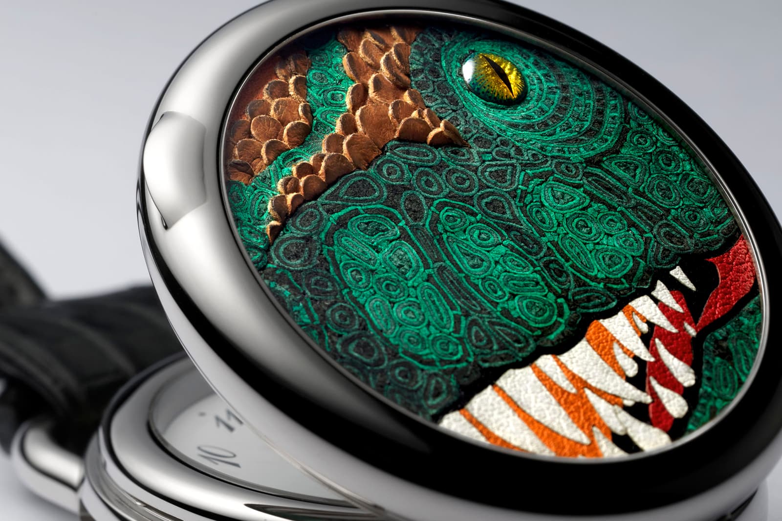  The new Arceau pocket watch features the most charming close-up of a Tyrannosaurus Rex on its cover