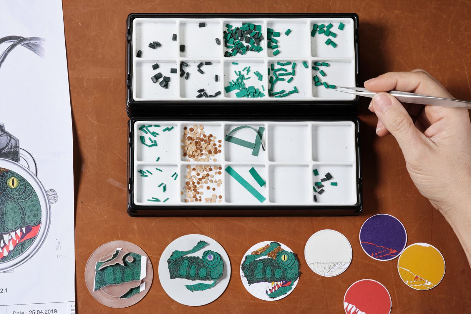  Each of the miniature leather tesserae was hand cut to fit the design