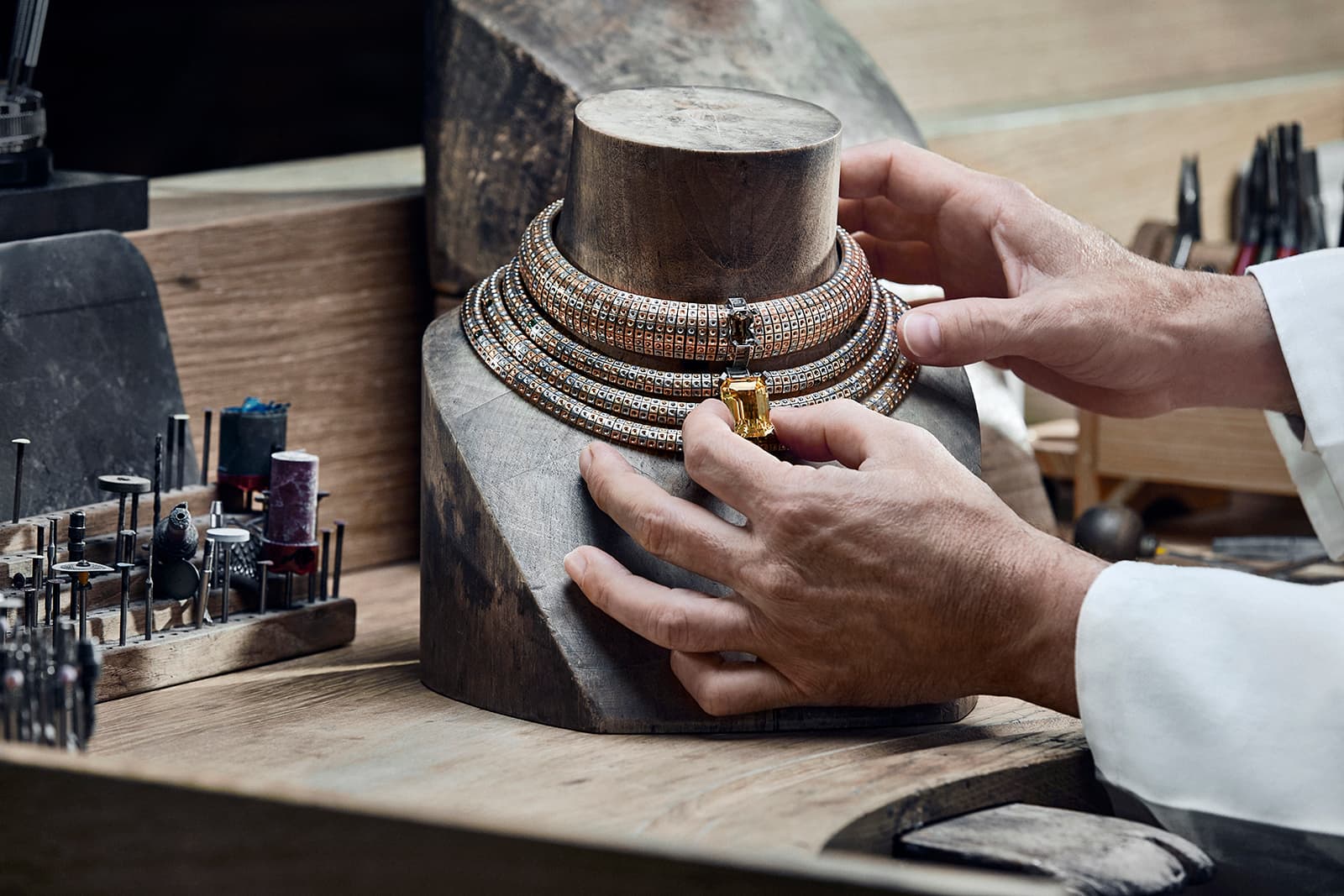  The transformable Soleils necklace was crafted using the LV signature checkerboard pattern