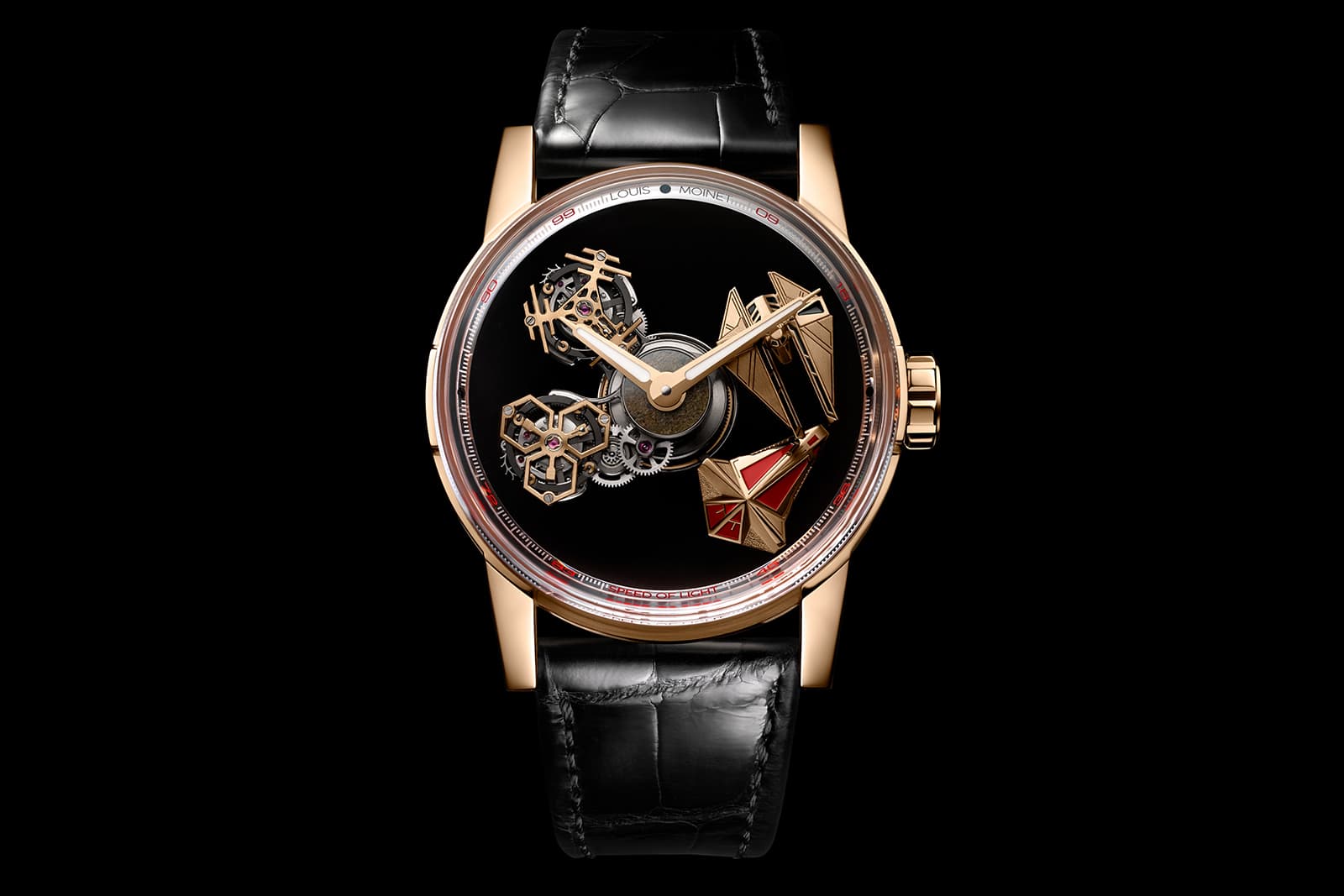  To the left of the dial, double tourbillons disguised as space stations rotate on their axes once a minute
