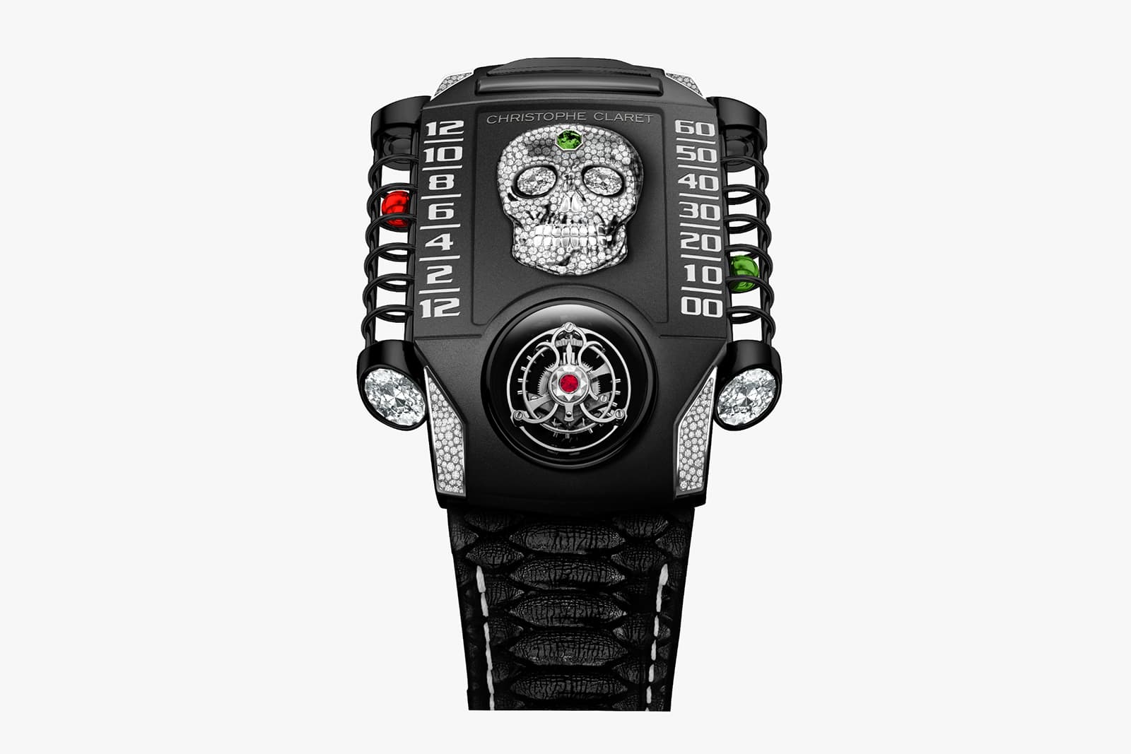  Vibrant accents introduce the colours of Mexico, with the red and green steel spheres accompanied by a ruby set in the heart of the double flying tourbillon and an emerald in the centre of the skull’s forehead  