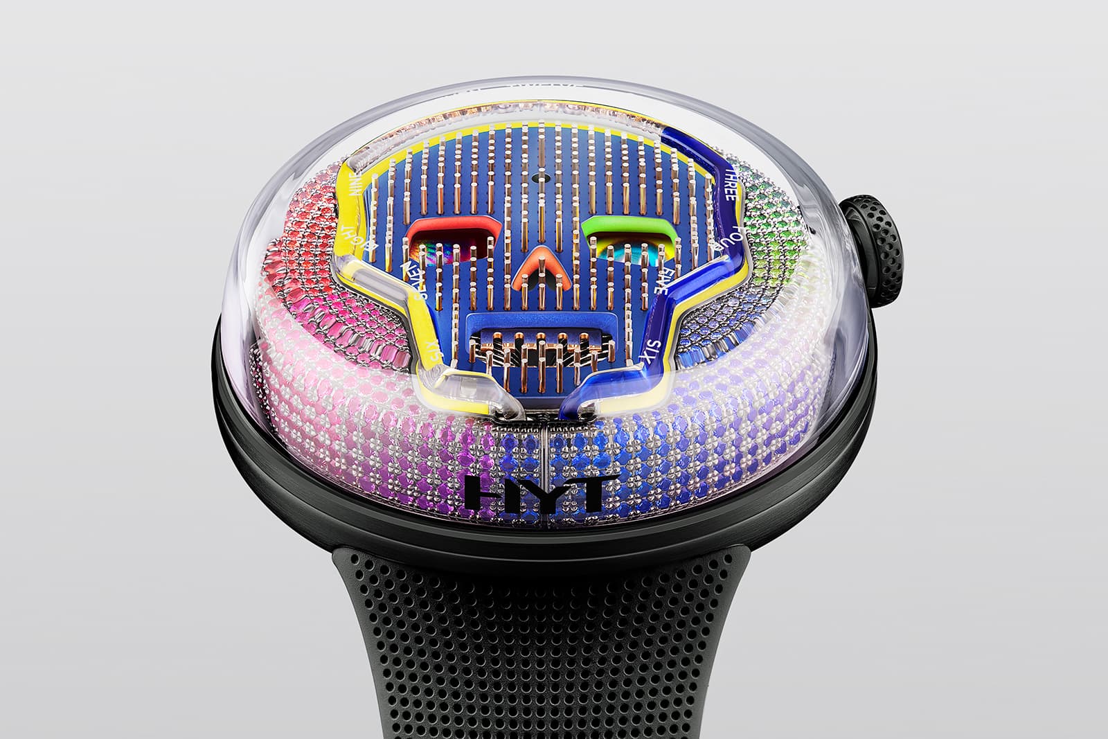  Marked with the hours, a capillary tube filled with two liquids, one transparent, the other blue, on top of a yellow SLN track traces the outline of the skull, with the yellow representative of the past and blue the future