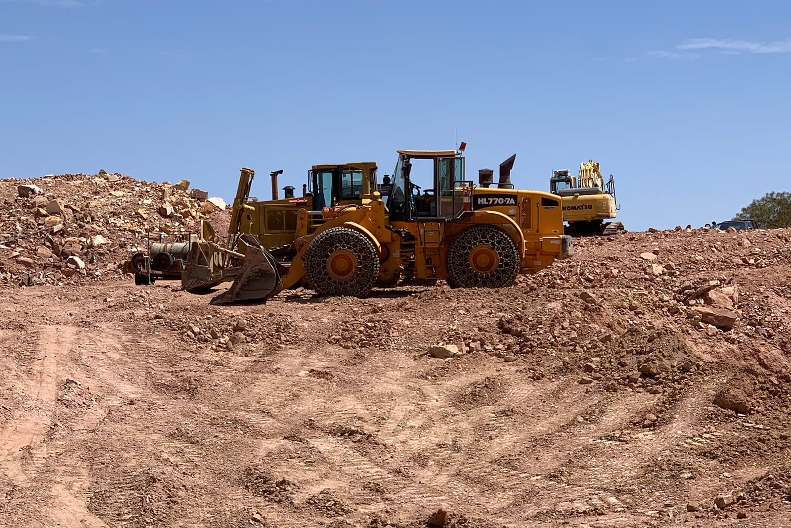  John Bernard and his brother Ron work with just two bulldozers, one excavator, one loader and a drill