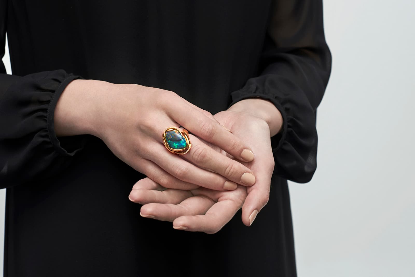  The Contrarian black opal ring by Opal Minded features an unusual marriage of colour palettes