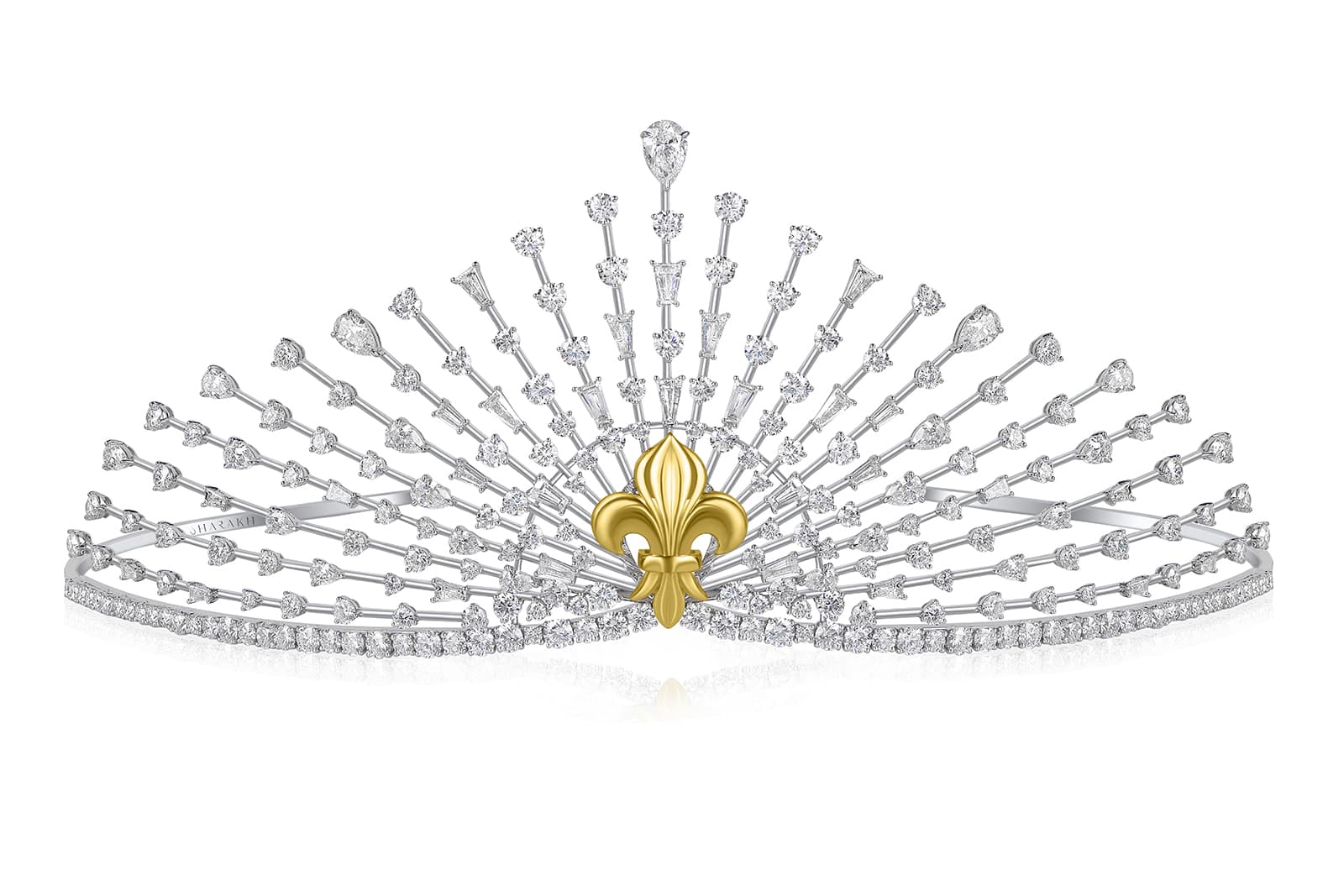  The tiara was created with a central yellow gold 'Fleur De Lis', the royal symbol of HRH Princess Louise d'Orléans, surrounded by an array of diamonds that spread like the wings of a peacock
