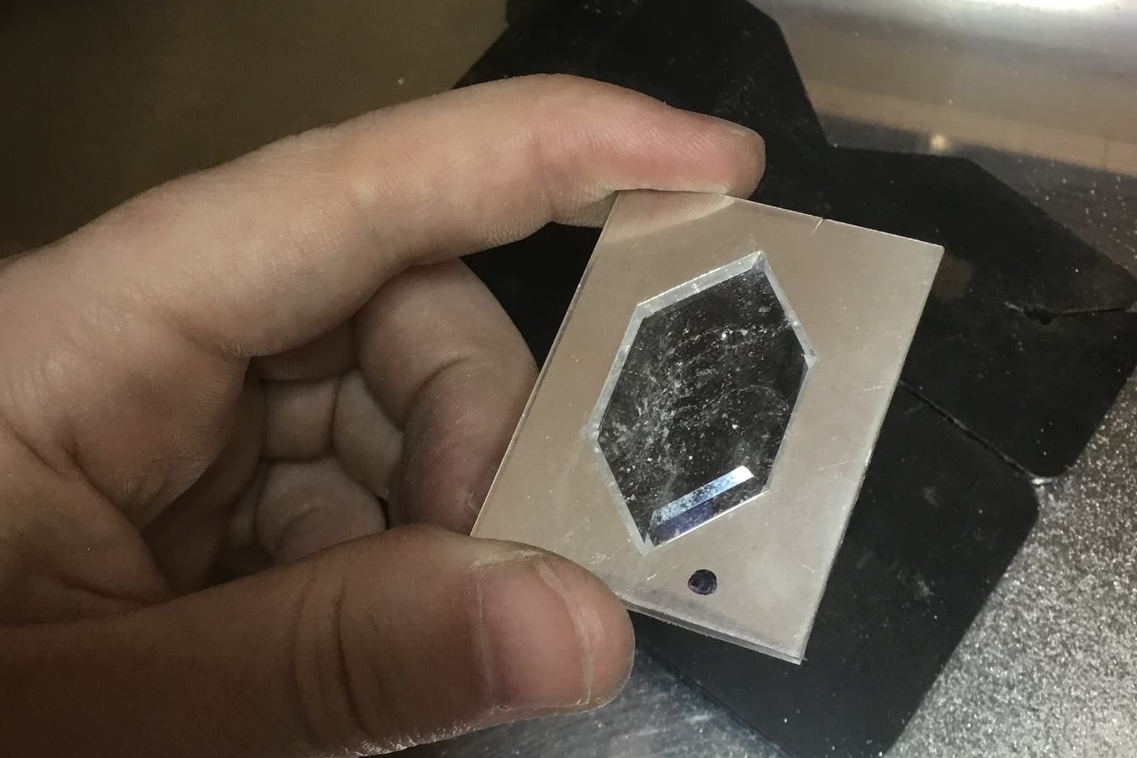  Carving rock crystal to evoke frozen water for David Michael's Winter Koi Pond brooch