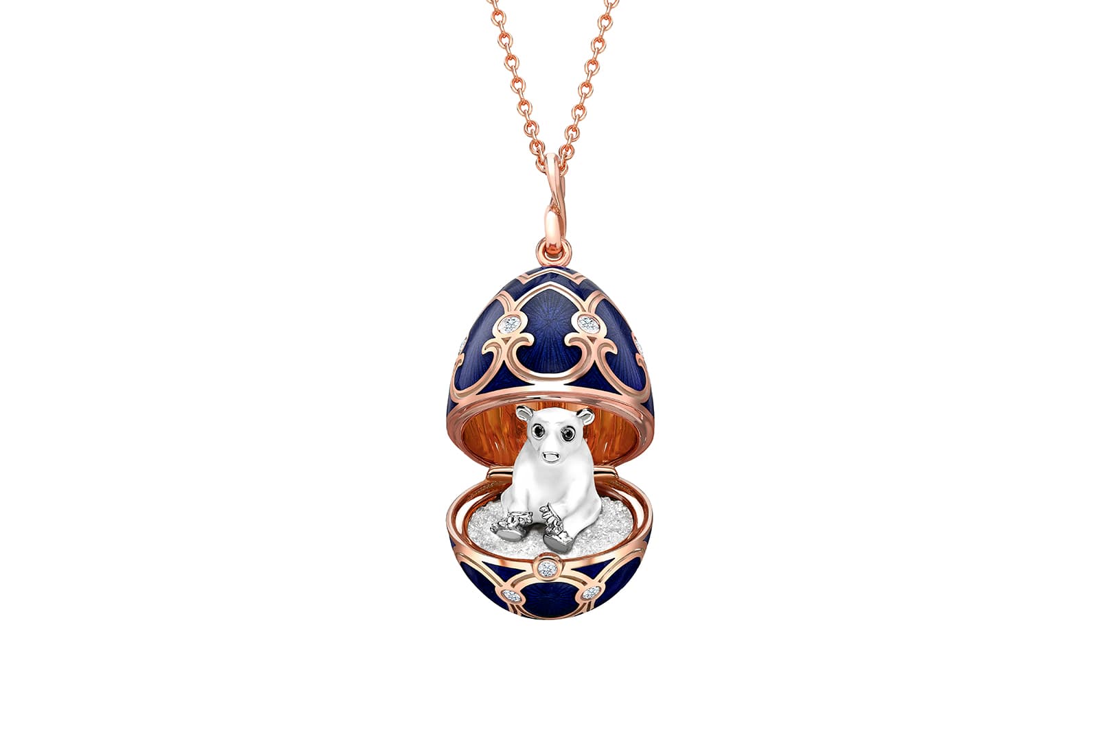  Inside the Fabergé Polar Bear Surprise locket is a white gold polar bear, with white enamel and black diamond eyes