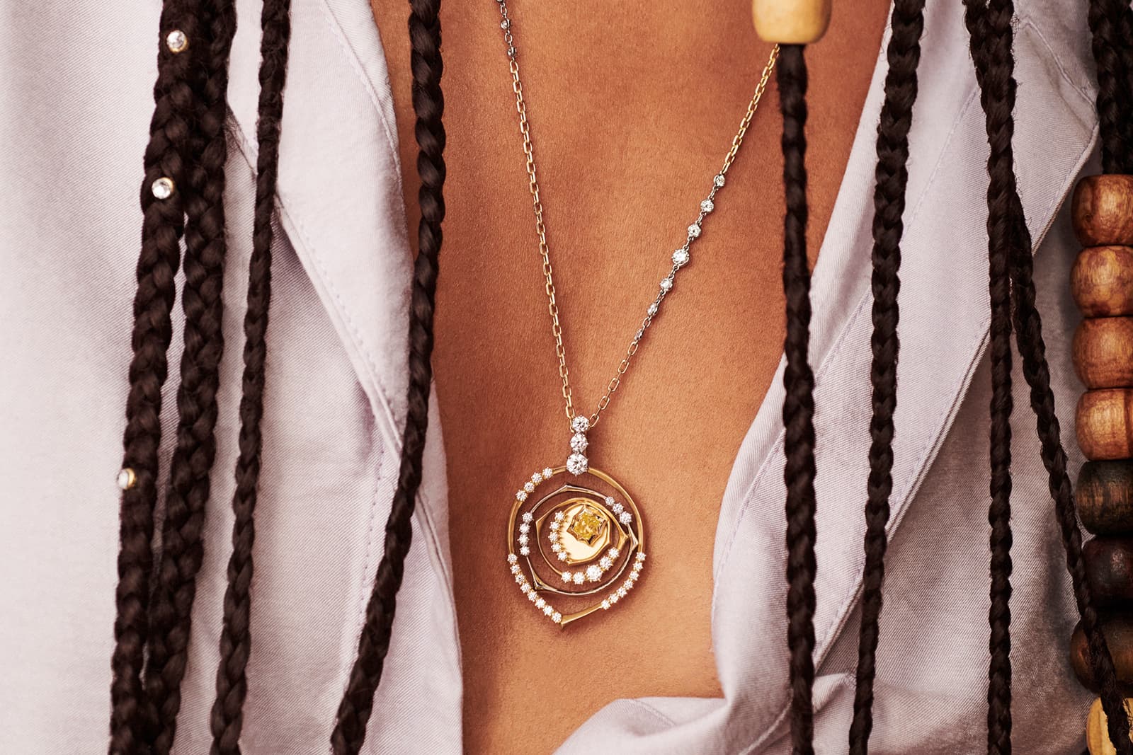  Jade Trau's pendant with a diamond-set chain