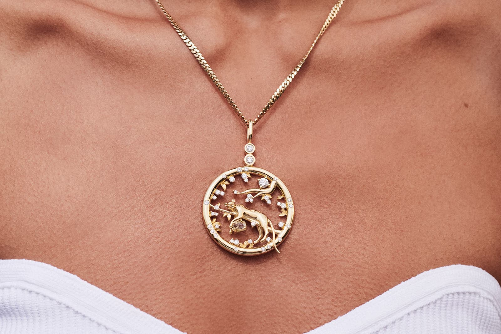  Jennie Kwon's pendant with a sculpted yellow gold leopard surrounded by  diamonds