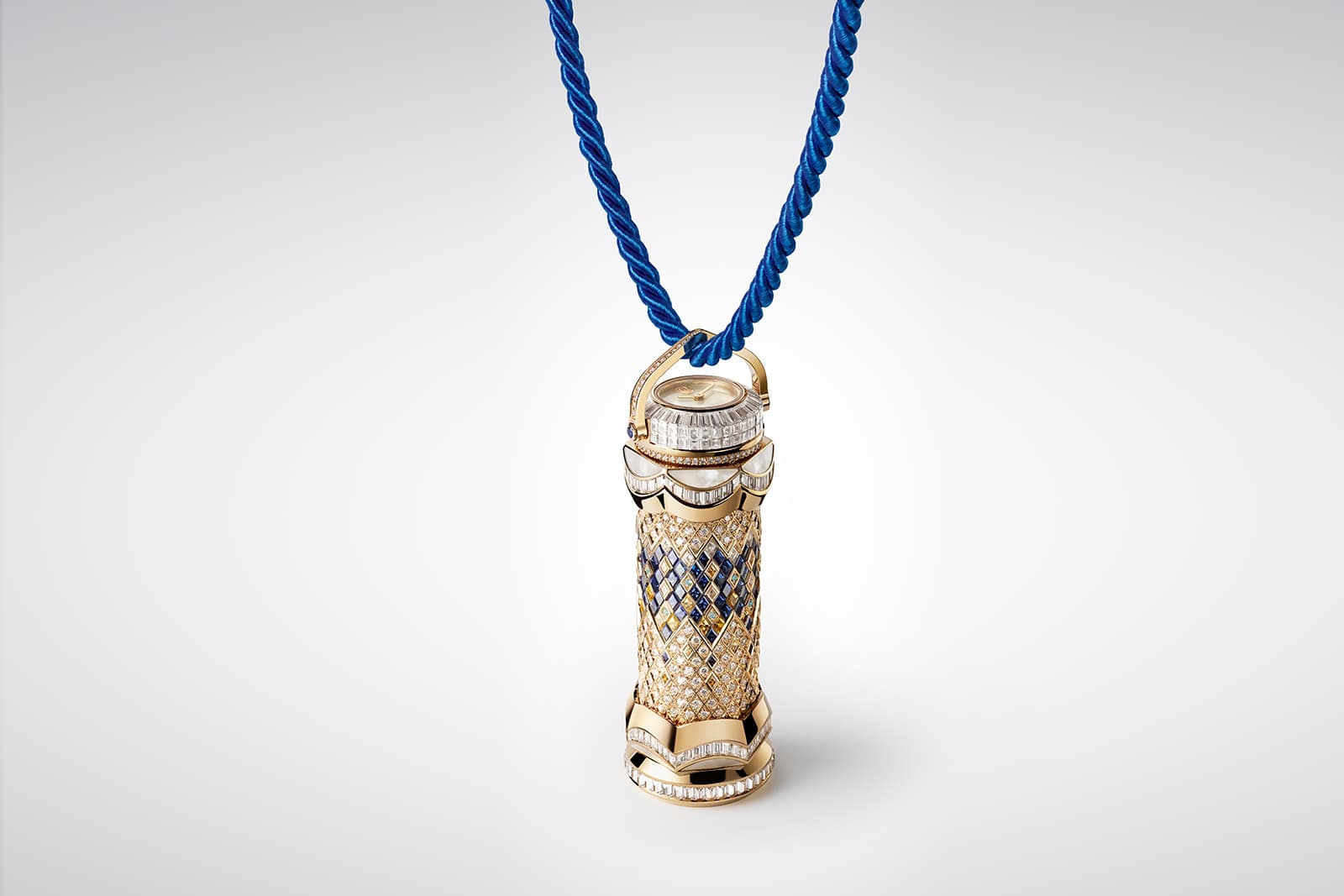 Harry Winston The Ultimate Kaleidoscope decorated with 100 baguette cut diamonds, blue and yellow sapphires and Paraiba tourmalines