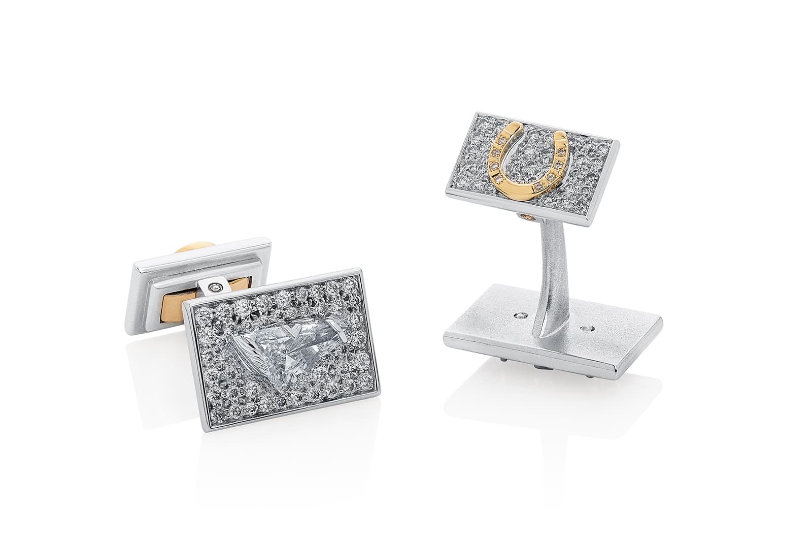 Thelma West Front Runner bespoke cufflinks featuring two 2.50 carat horse head-shaped diamonds set into platinum with a further 2 carats of white diamonds