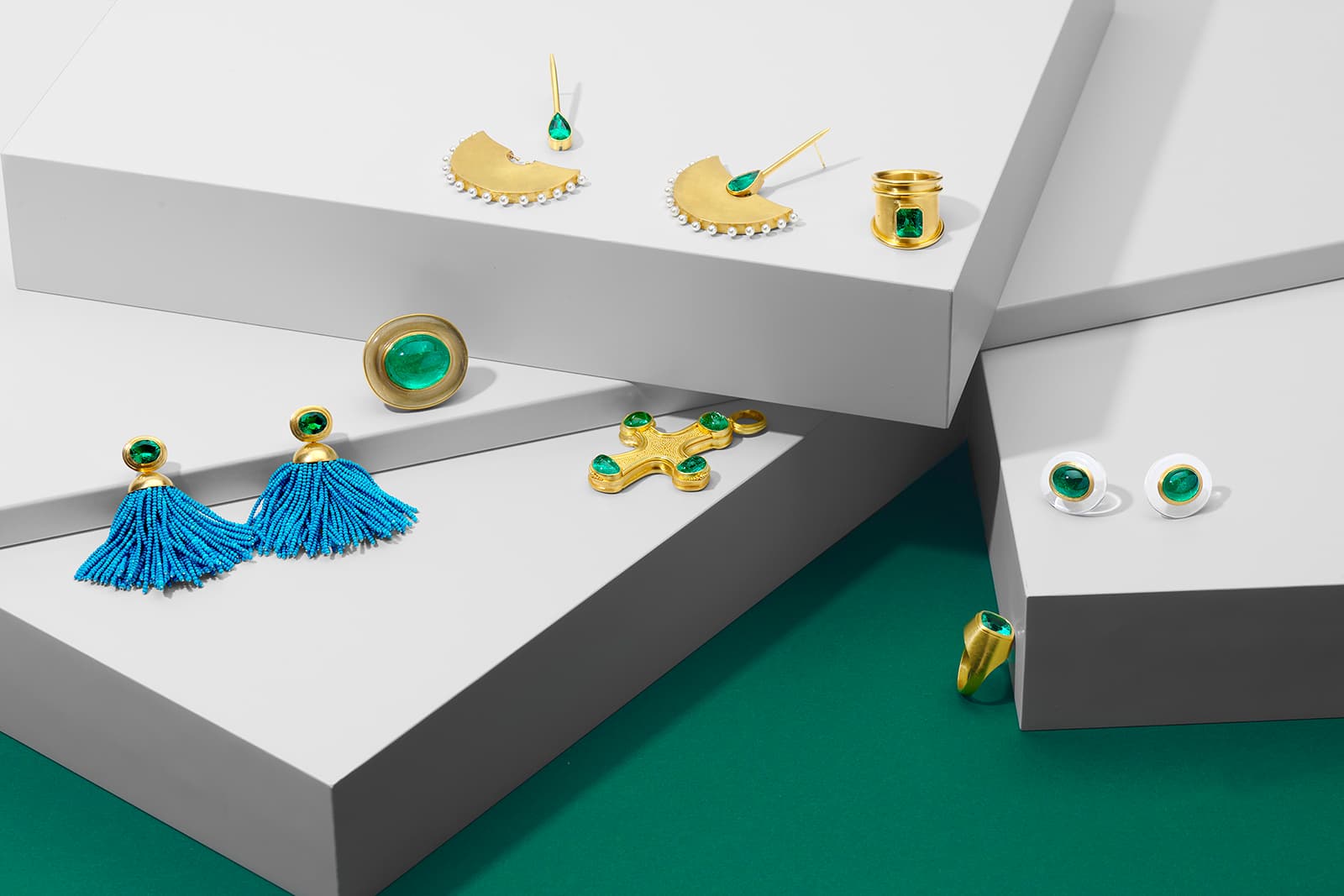 The yellow gold and Muzo emerald pieces created by Loren Nicole as part of the design collaboration