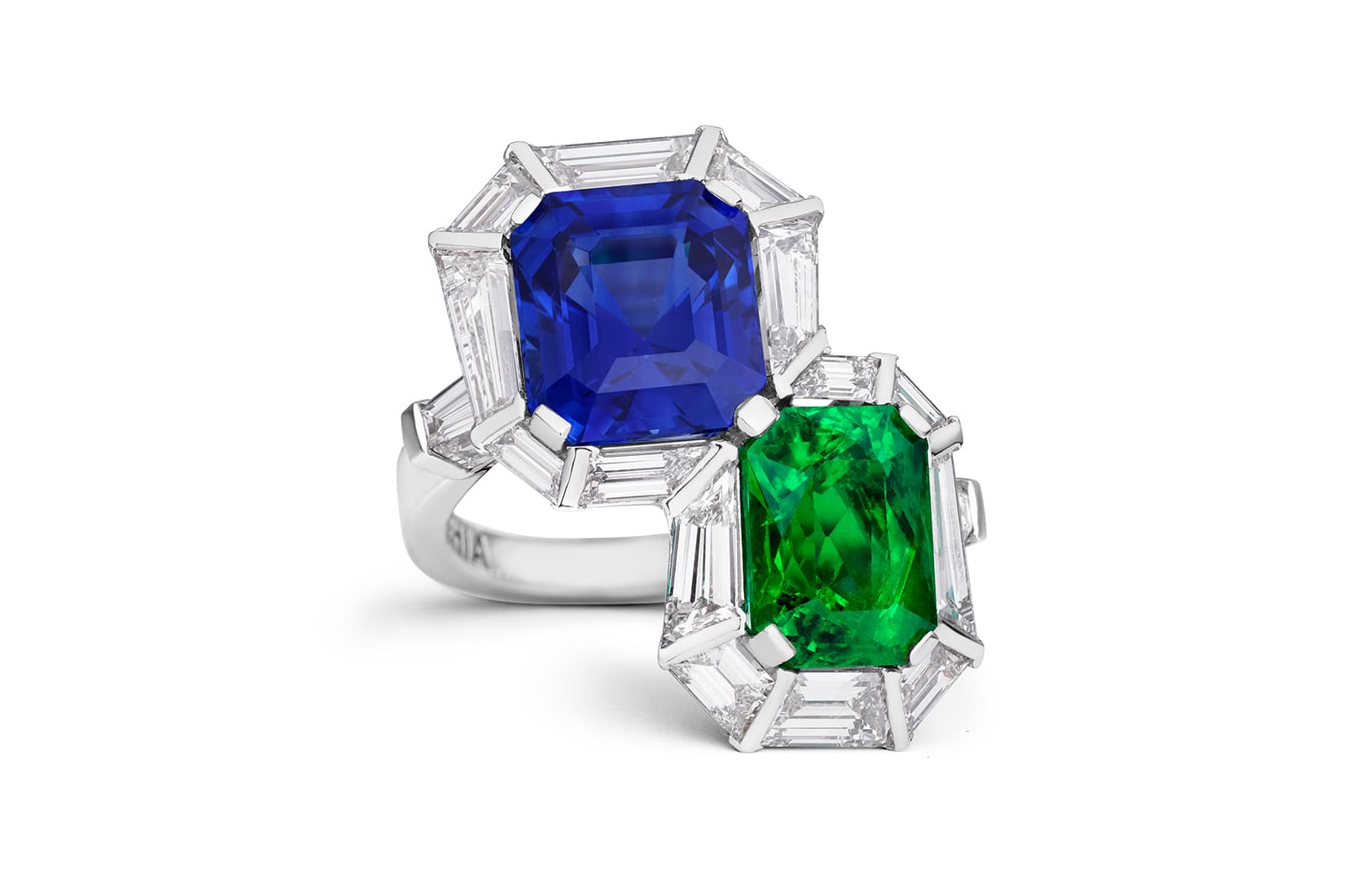  Two cocktail rings by Paul Morelli set with a sapphire and emerald with baguette-cut diamonds