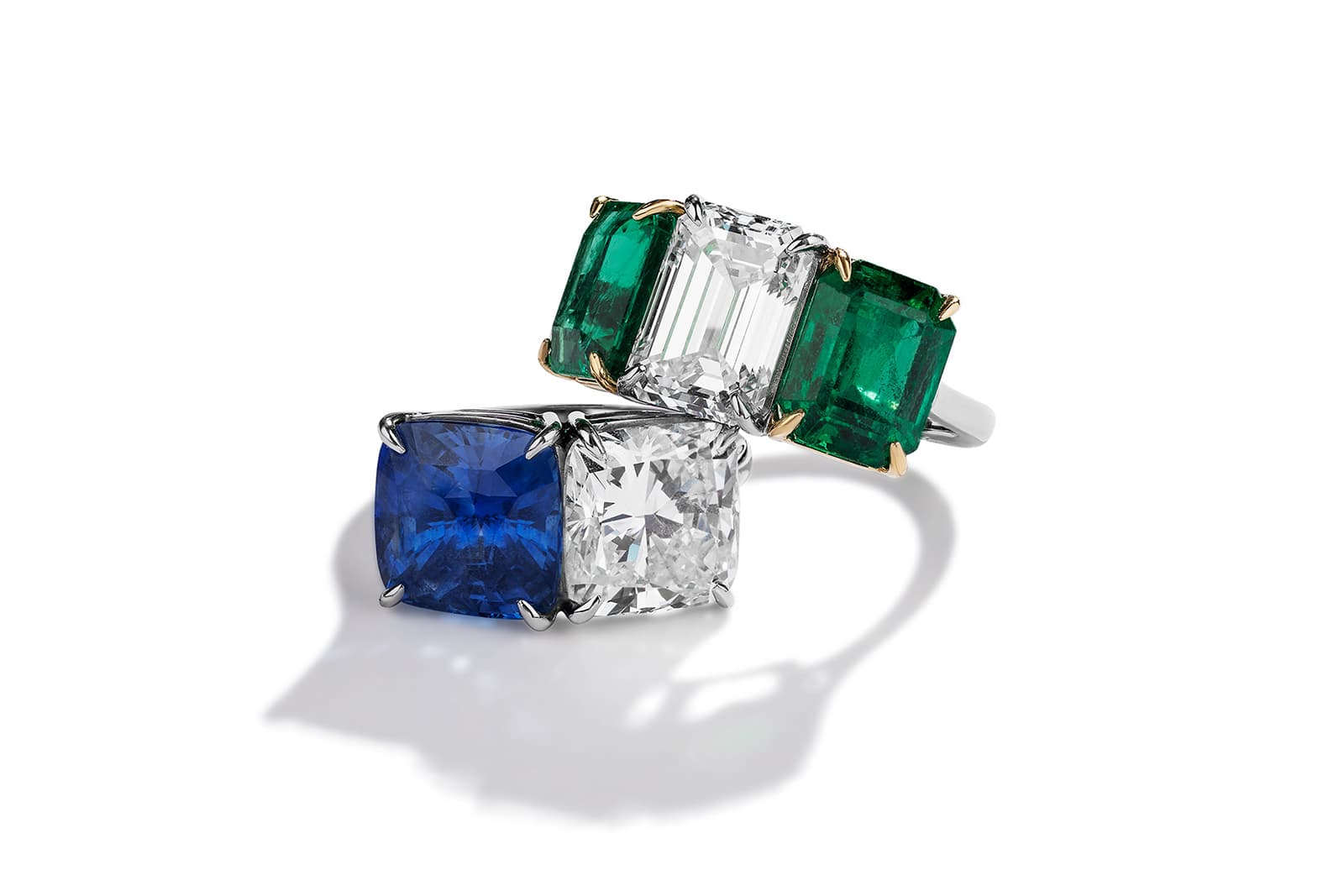  Piranesi three-stone diamond and emerald ring and a 'Toi et Moi' sapphire and diamond ring
