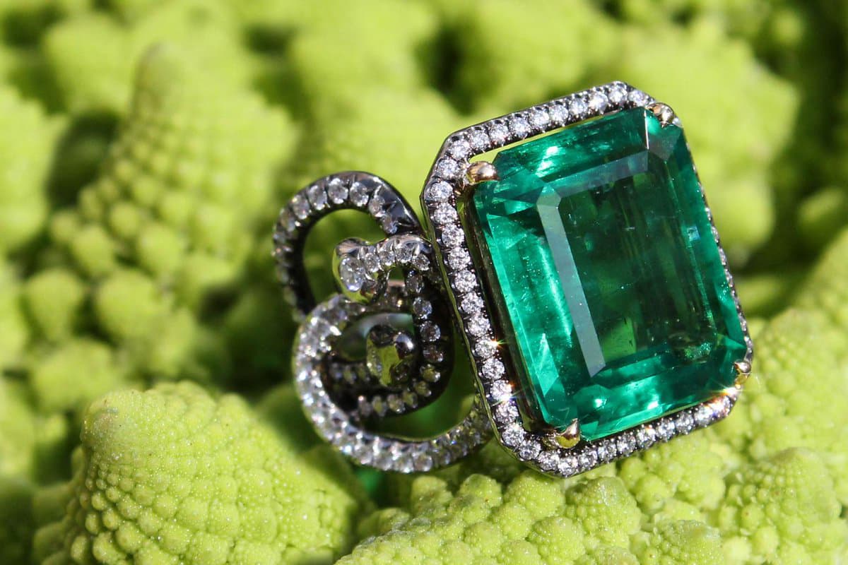 AENEA Sarpa collection ring with an 8.32 carat octagonal emerald and diamonds in in yellow gold, platinum, sterling silver and rhodium