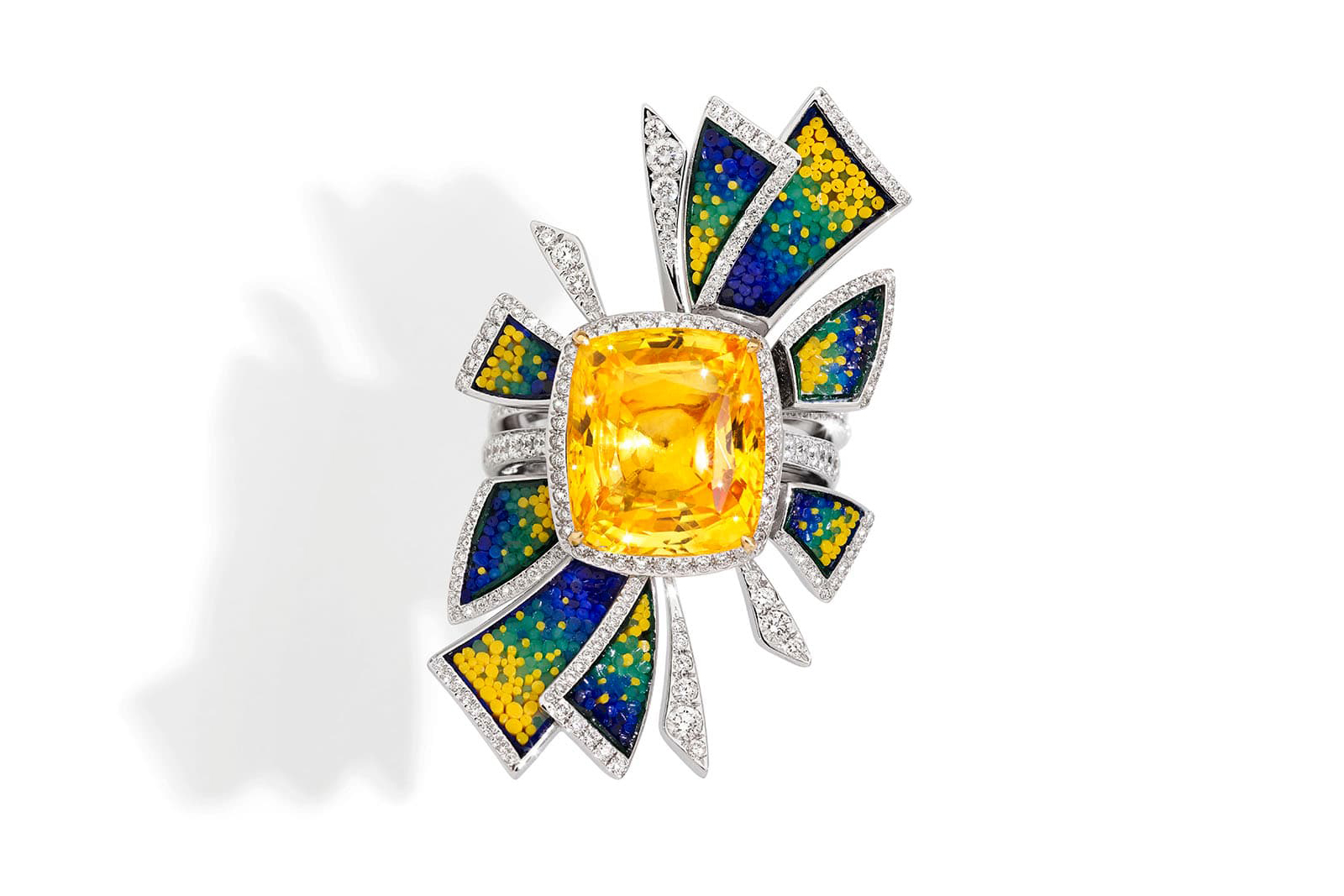 The SICIS Joyful ring from the Tesserae is inspired by rays of sunlight with a central sapphire, diamonds and micro-mosaics