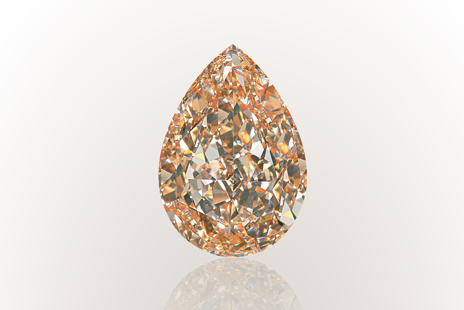  At the heart of Anna Hu's necklace is this 27.02 carat brown-yellow pear-shaped diamond
