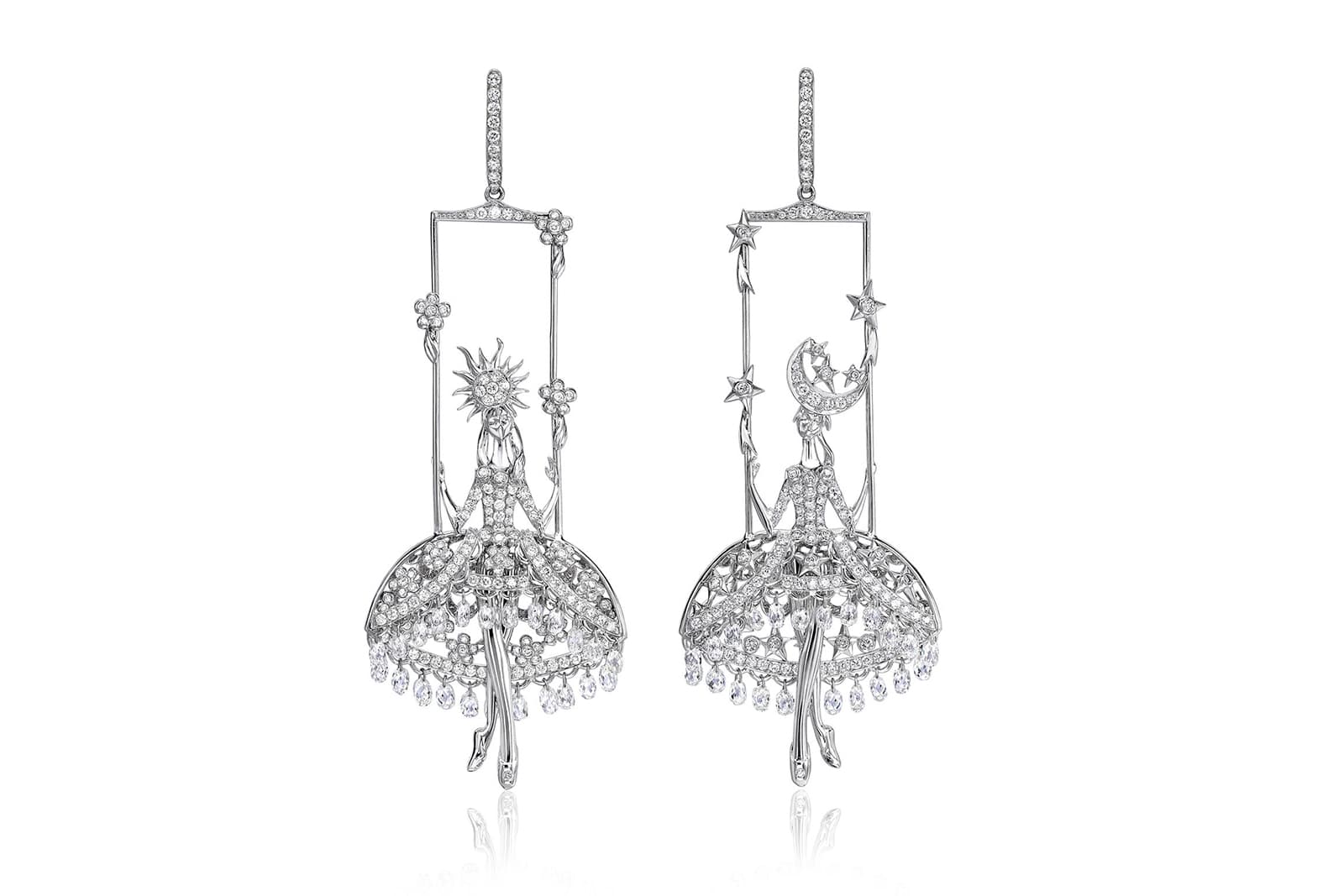  These white gold and diamond earrings by Sybarite have working swings, with diamond briolettes hemming the skirts to add an extra layer of movement