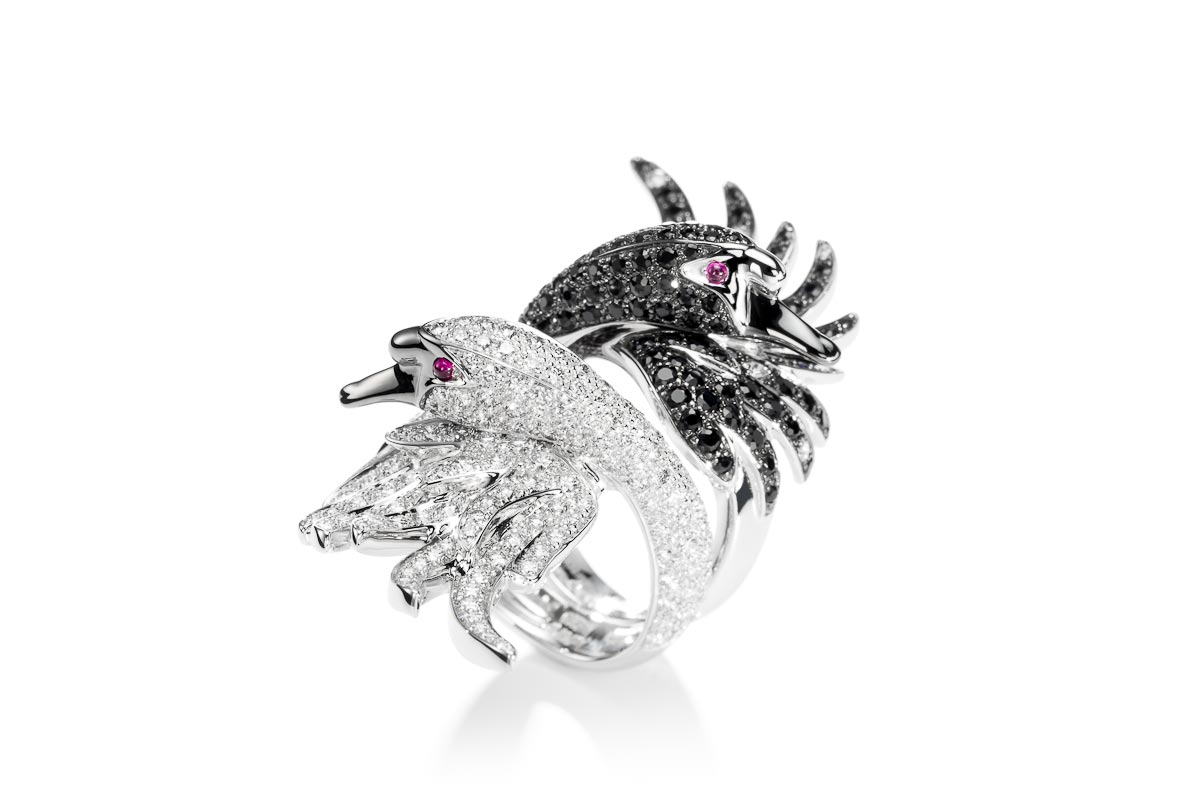  Two Boucheron Cypris swan rings with white diamonds and black sapphires with ruby eyes 