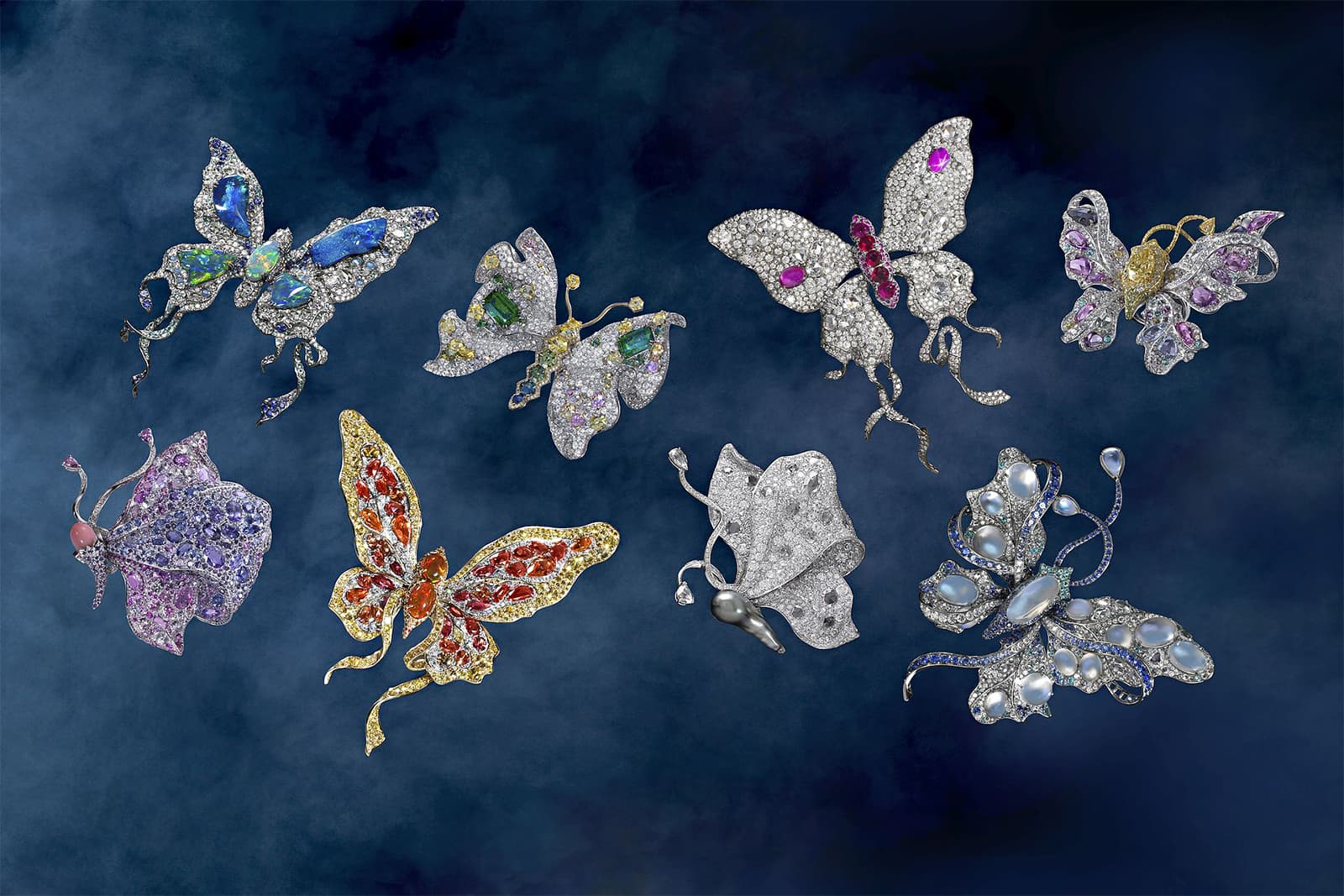  A selection of diamond, ruby, sapphire, garnet and coloured gemstone butterflies, crafted in titanium, by Anna Hu