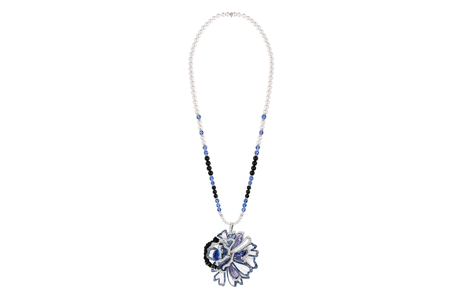  Chaumet in Bloom Esquisse de Chaumet transformable necklace/brooch in white gold, set with a Sri Lankan 6.13 carat oval-cut sapphire, onyx, tanzanite, mother-of-pearl and brilliant-cut diamonds 