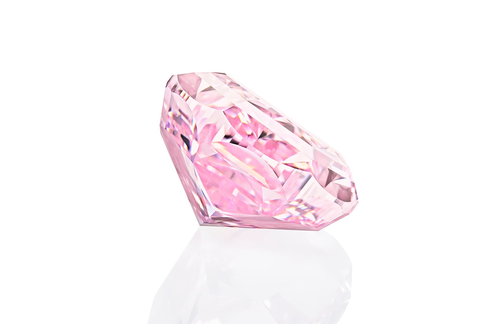  The Spirit of the Rose pink diamond has a delicate petal pink hue and a symmetrical oval shape
