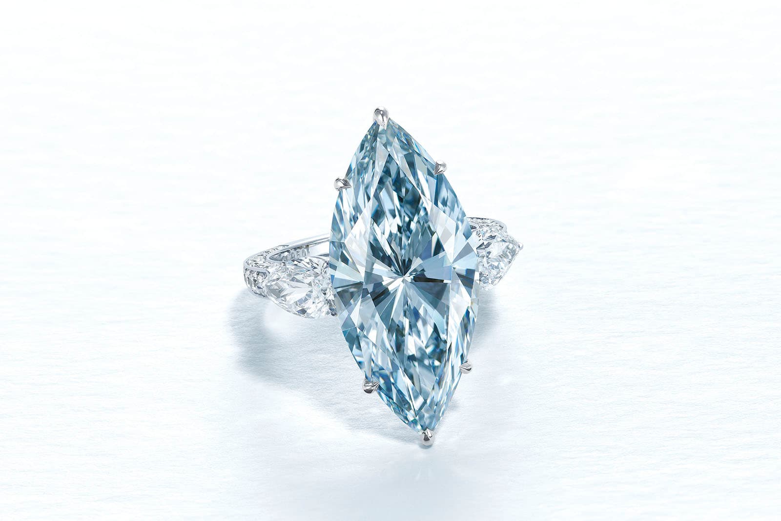  The 12.11 carat fancy intense blue diamond, set in a ring with two white diamonds, sold for $12.3 million at Christie's Hong Kong