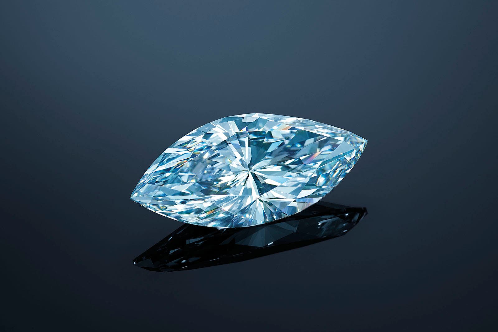 A 12.11 carat internally flawless marquise-shaped fancy intense blue diamond