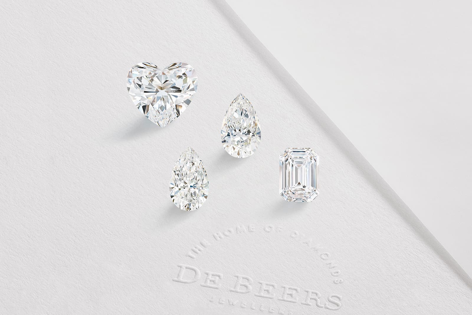  Four diamonds, including an 18 carat heart-shaped gem, in the De Beers 1888 Master Diamonds Collection cut from an original rough stone of 129.71 carats 
