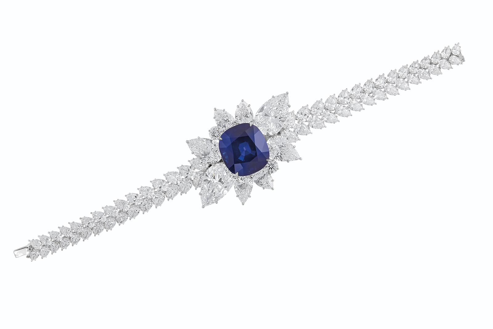  Surrounding the Kashmir sapphire are pear-shaped diamonds, with the largest being 8.94 carats