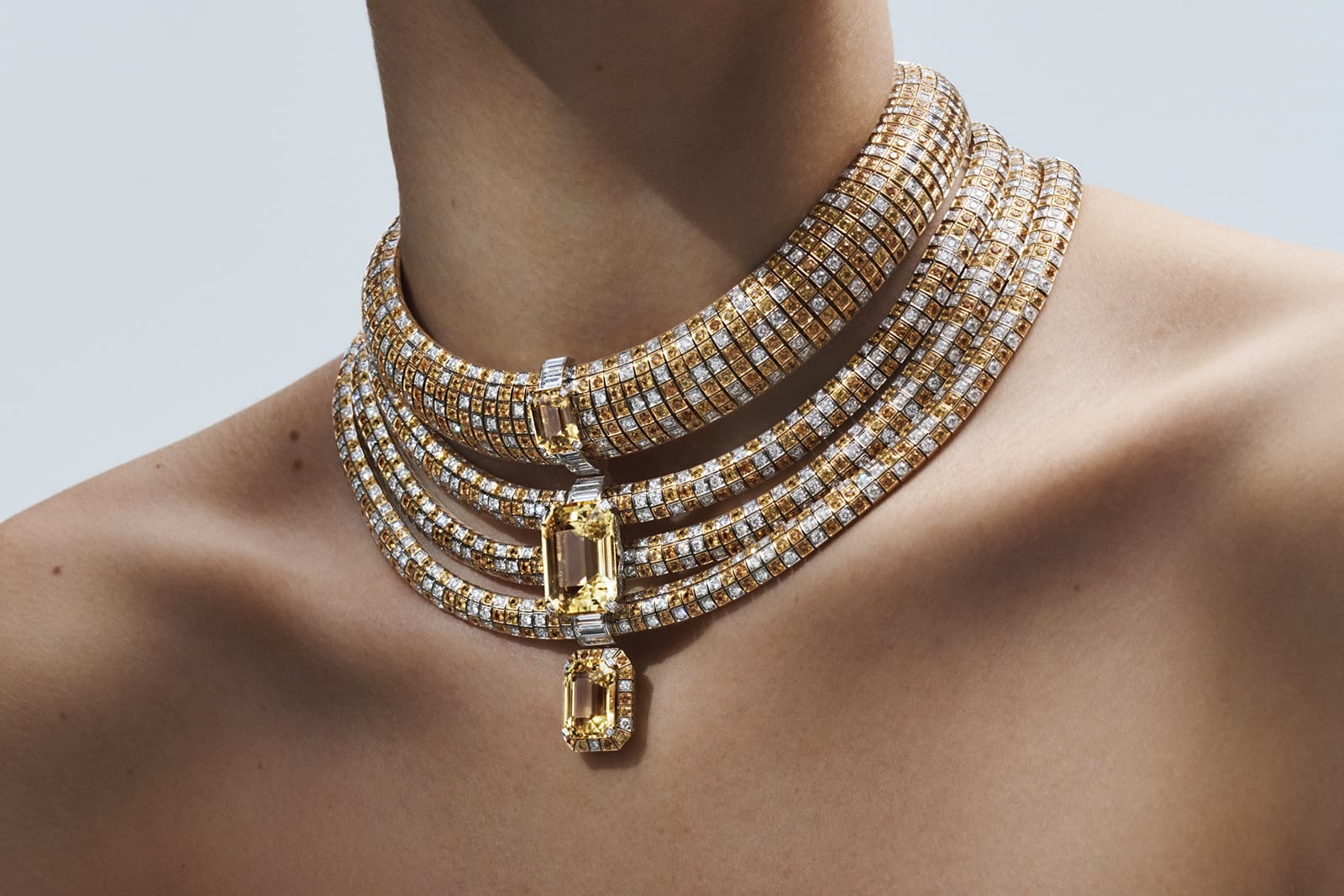  Louis Vuitton Stellar High Jewellery Collection Soleils necklace set with emerald-cut yellow sapphires, spessartite garnets, sapphires and diamonds